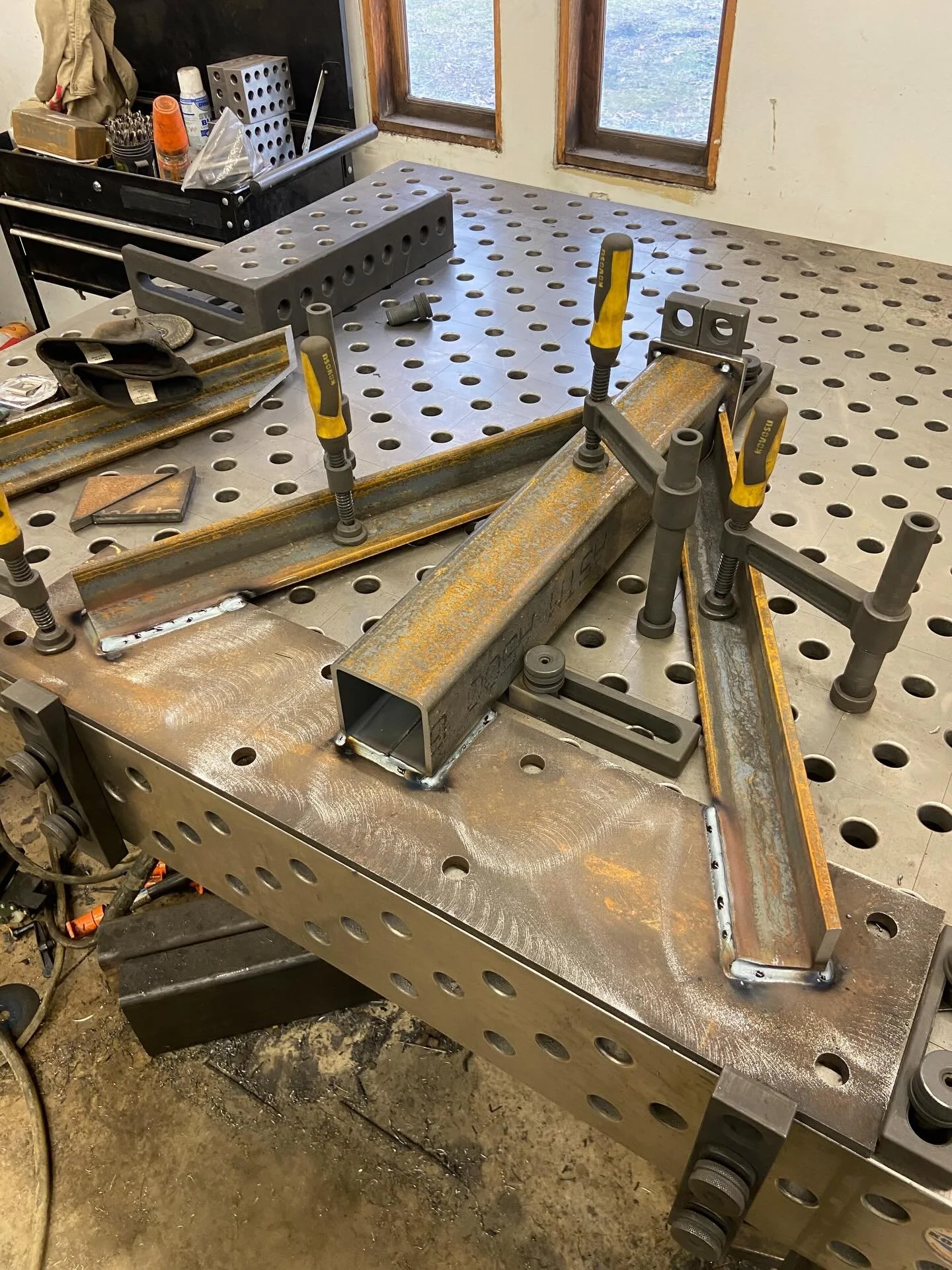 Some material cutting and fabrication on some structural brackets today. These will get galvinized due to that fact they will be underwater most of their life. Running some metalcore wire to speed things up. #welder #welding #metalfabricator #shopwor