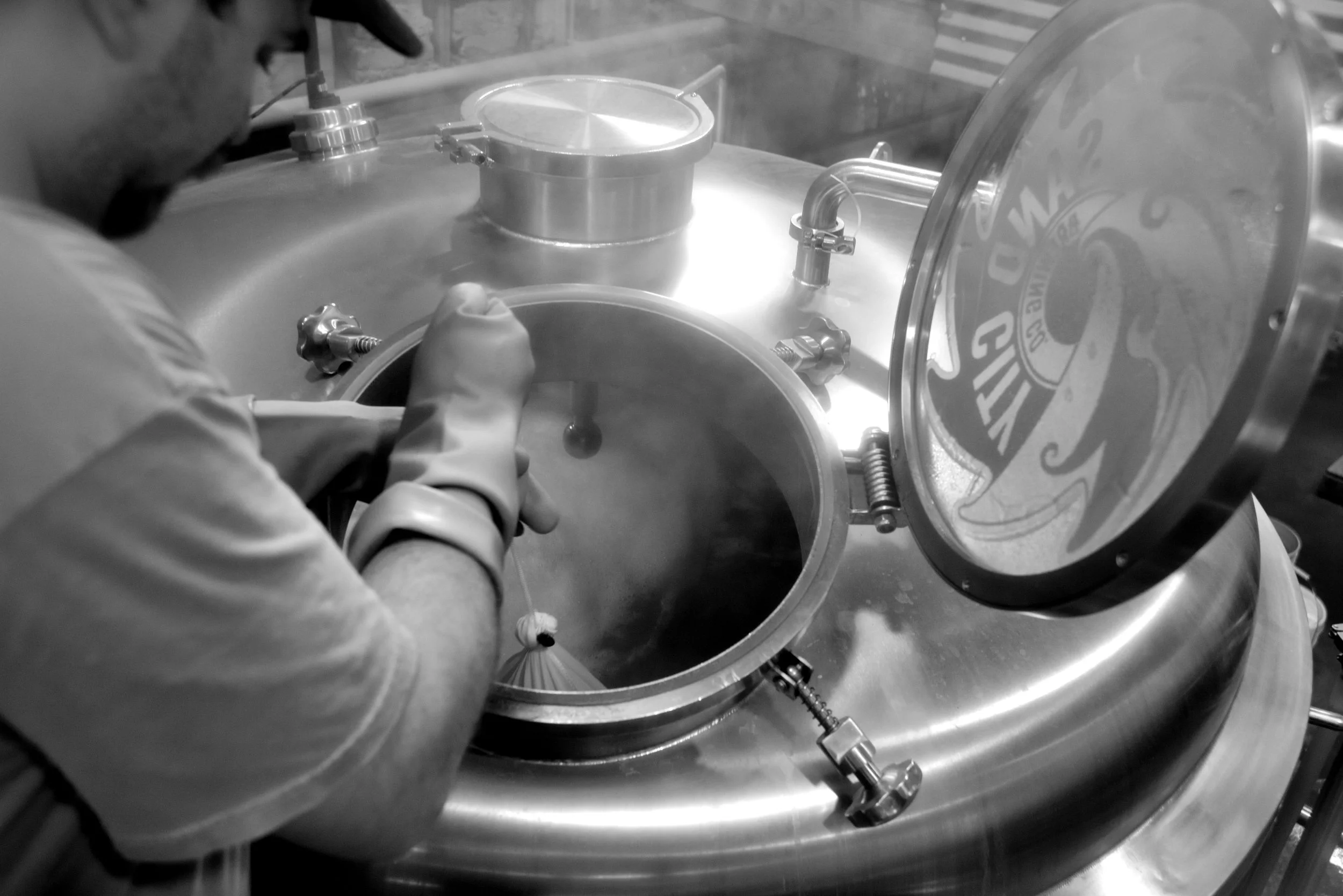 011.NICK ADDS HOPS AND BOTANICALS TO THE BREW.jpg