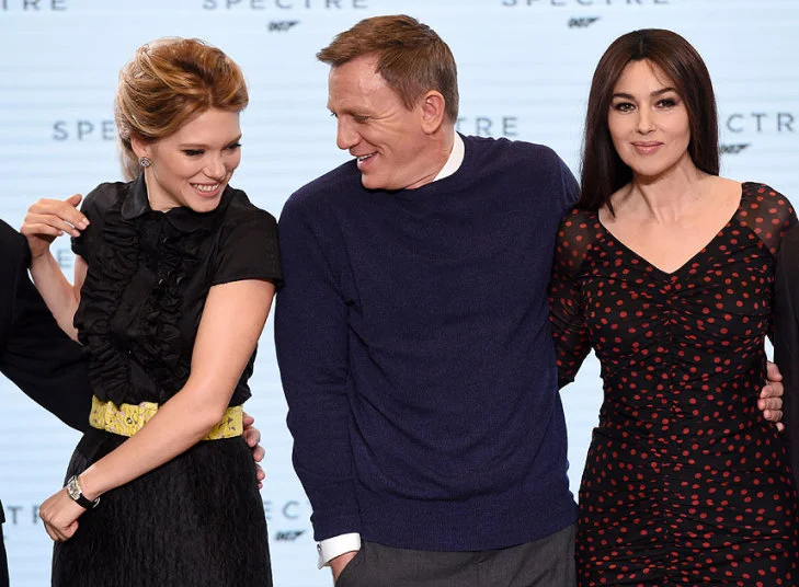 Cheeky: Daniel Craig with Spectre Bond girls Lea Seydoux (L) and Monica Bellucci (R)
