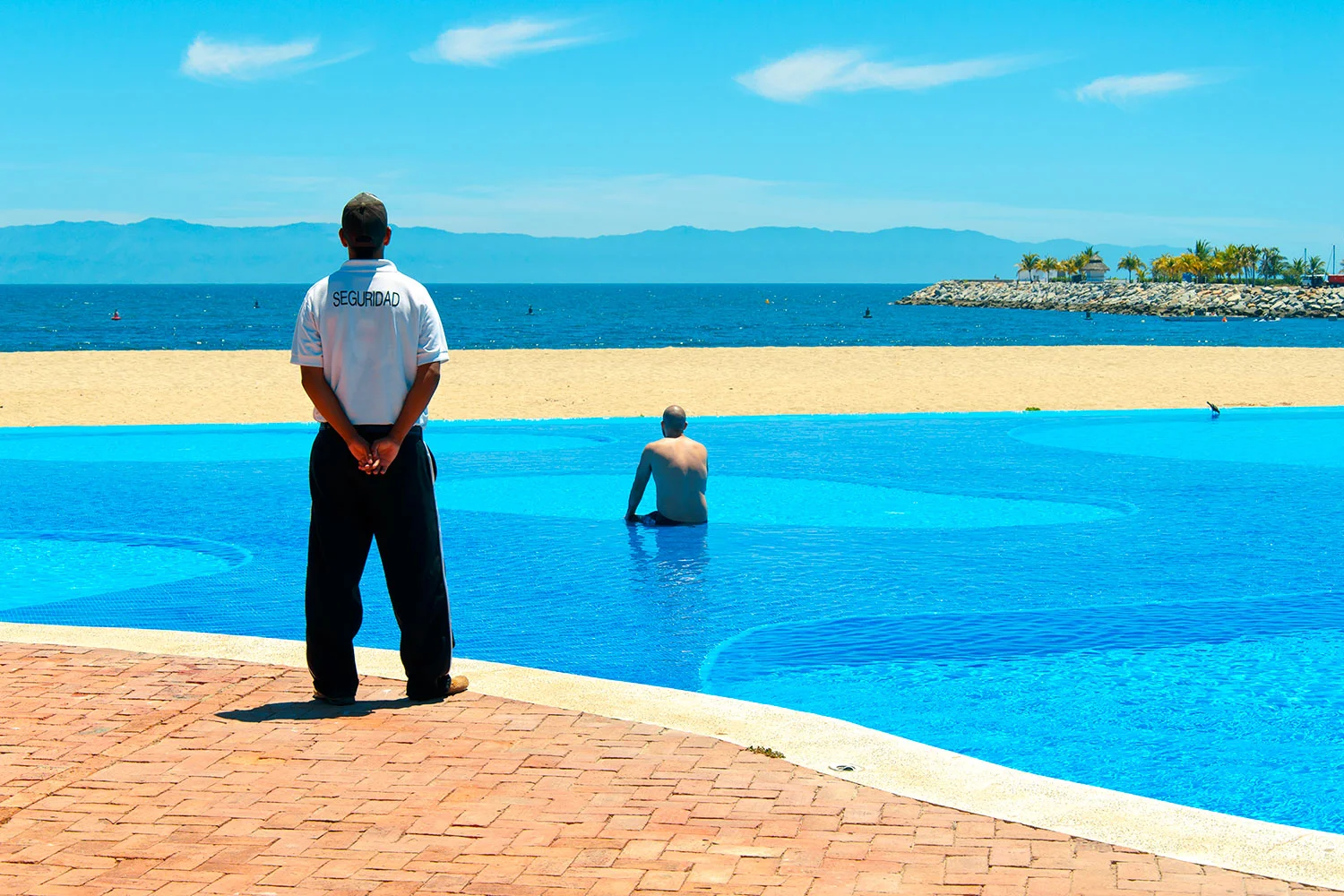 Operation Guest (Pool) site-specific performance (La Cruz de Huanacaxtle, MX), archival pigment print mounted on sintra 20" x 30" 2012