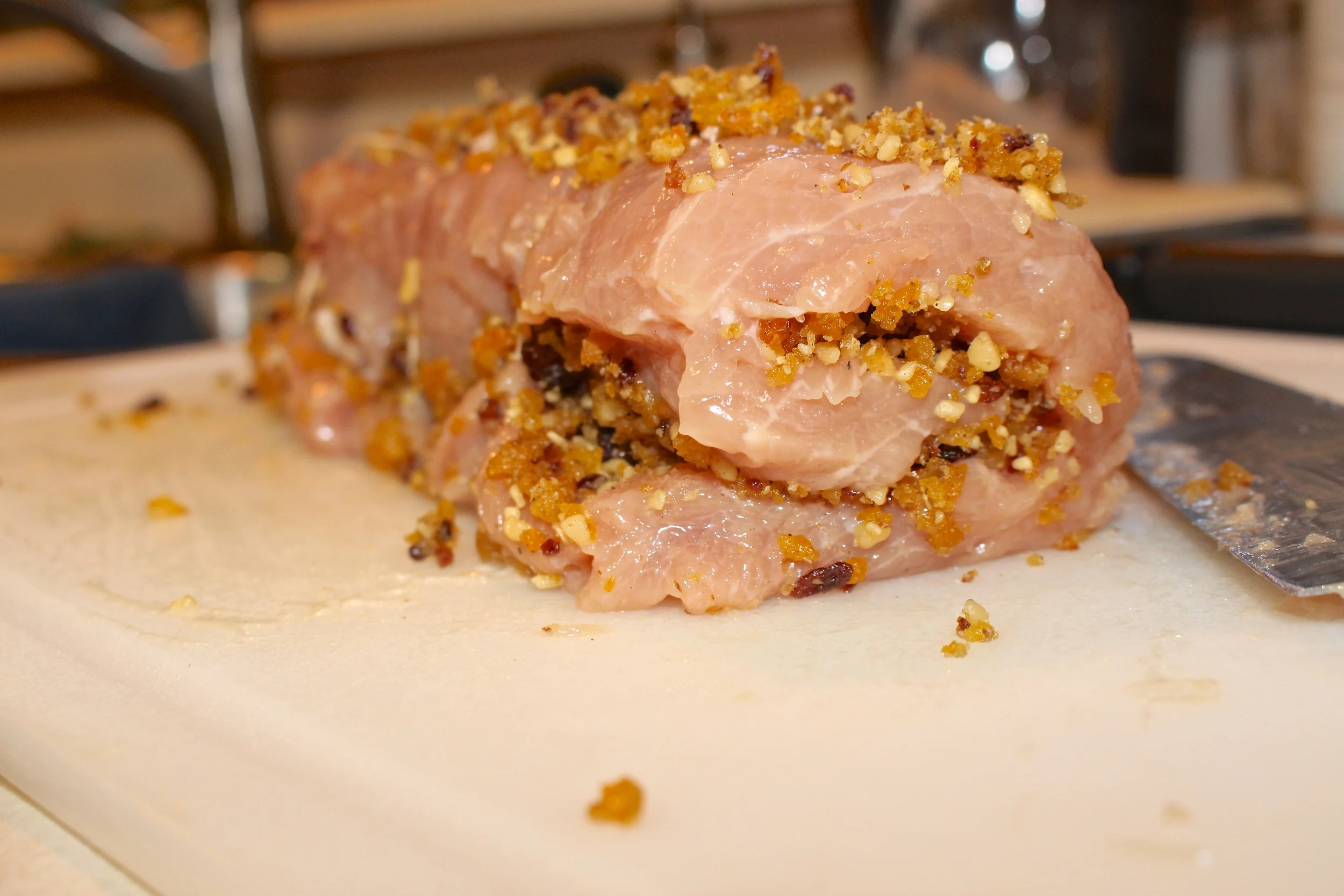 Add any extra stuffing to the top of the roast.