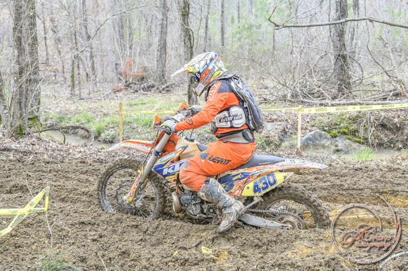 Terry navigating the deep mud. Photo by Tyra Crane: Crane Photography