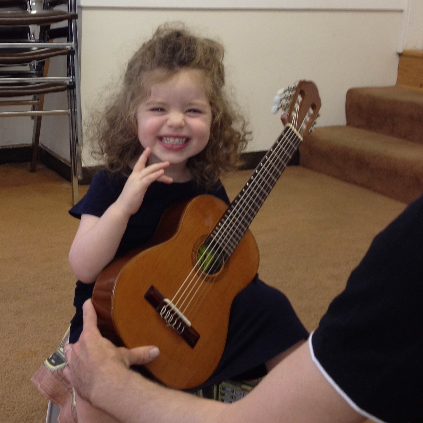 3 year old Suzuki guitar student