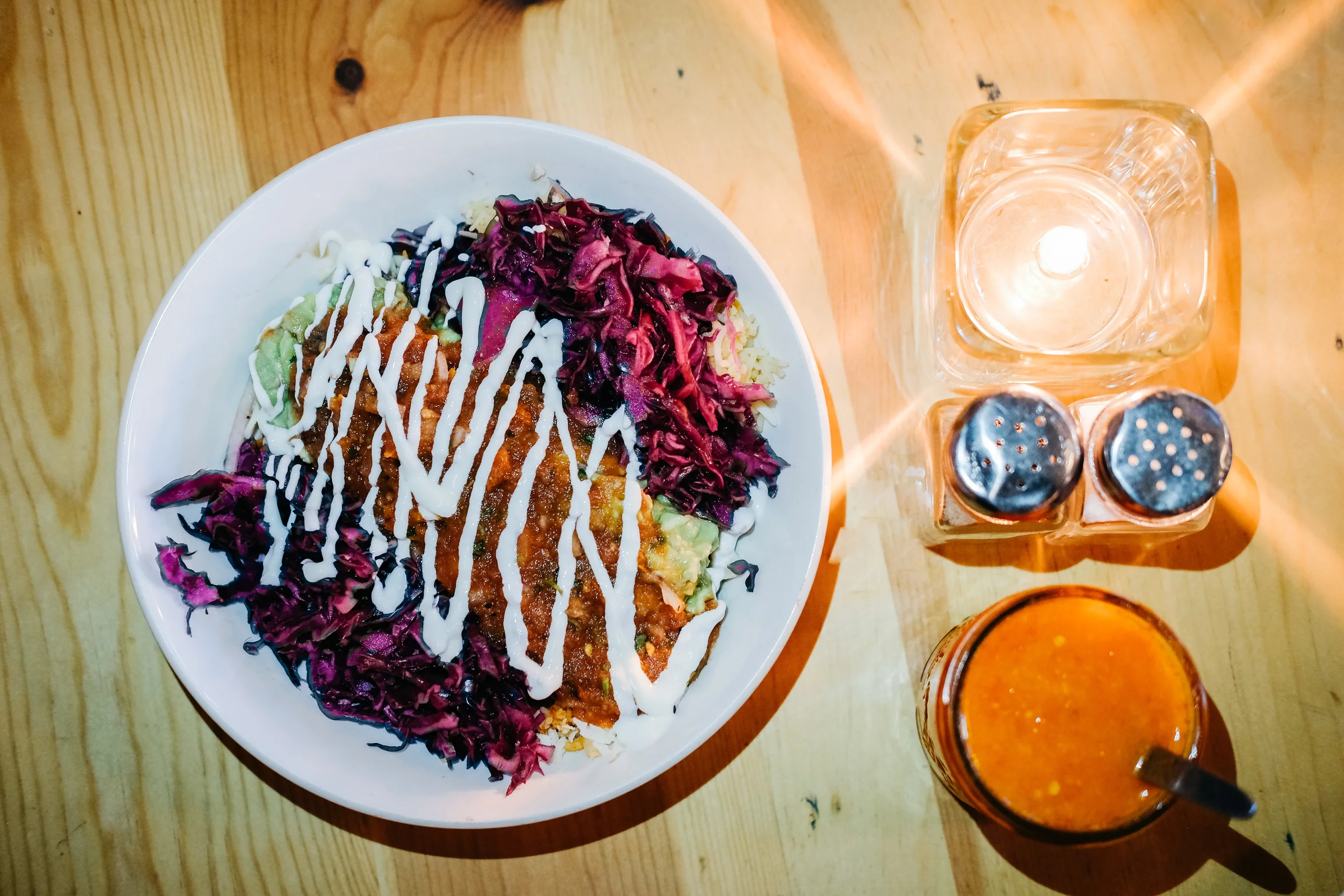 Wolf & Goats burrito bowl $9.50: Fresh guacamole, purple cabbage, pinto beans, roasted tomato salsa, cheese & sour cream. Yummy in the tummy.