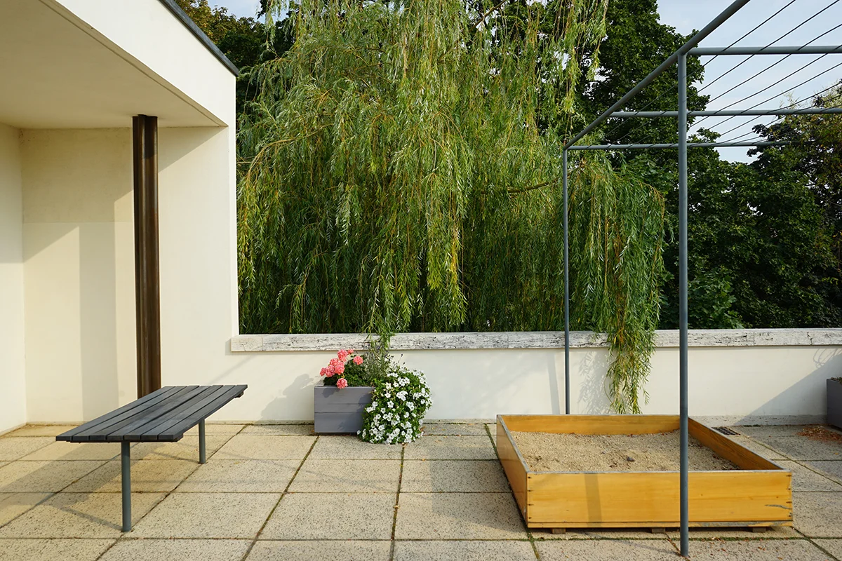 The upper terrace with sandbox at the Tugendhat House by Mies van der Rohe, where Ernst Tugendhat played in the afternoon, listening for the sound of the car horn signaling his father’s arrival home.