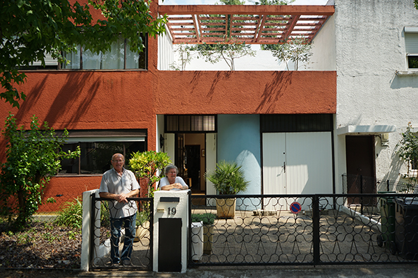 Mrs. Goron and her husband in front of their house by Le Corbusier in the Cité Frugès, Pessac where she grew up. The neighborhood reminded her of the buildings in Morocco where she lived before moving to Pessac with her family.