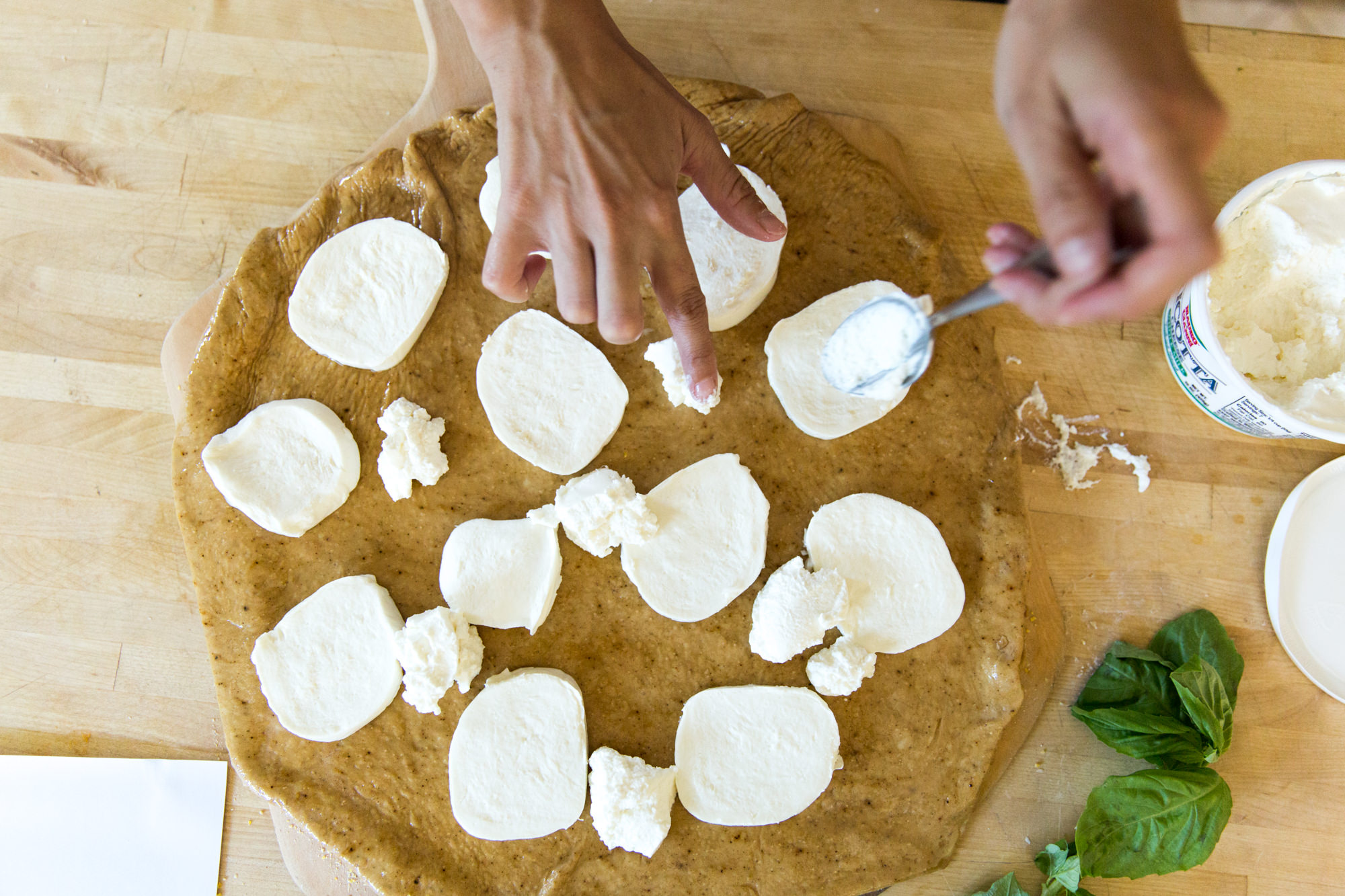 Placing Cheese on Pizza Dough