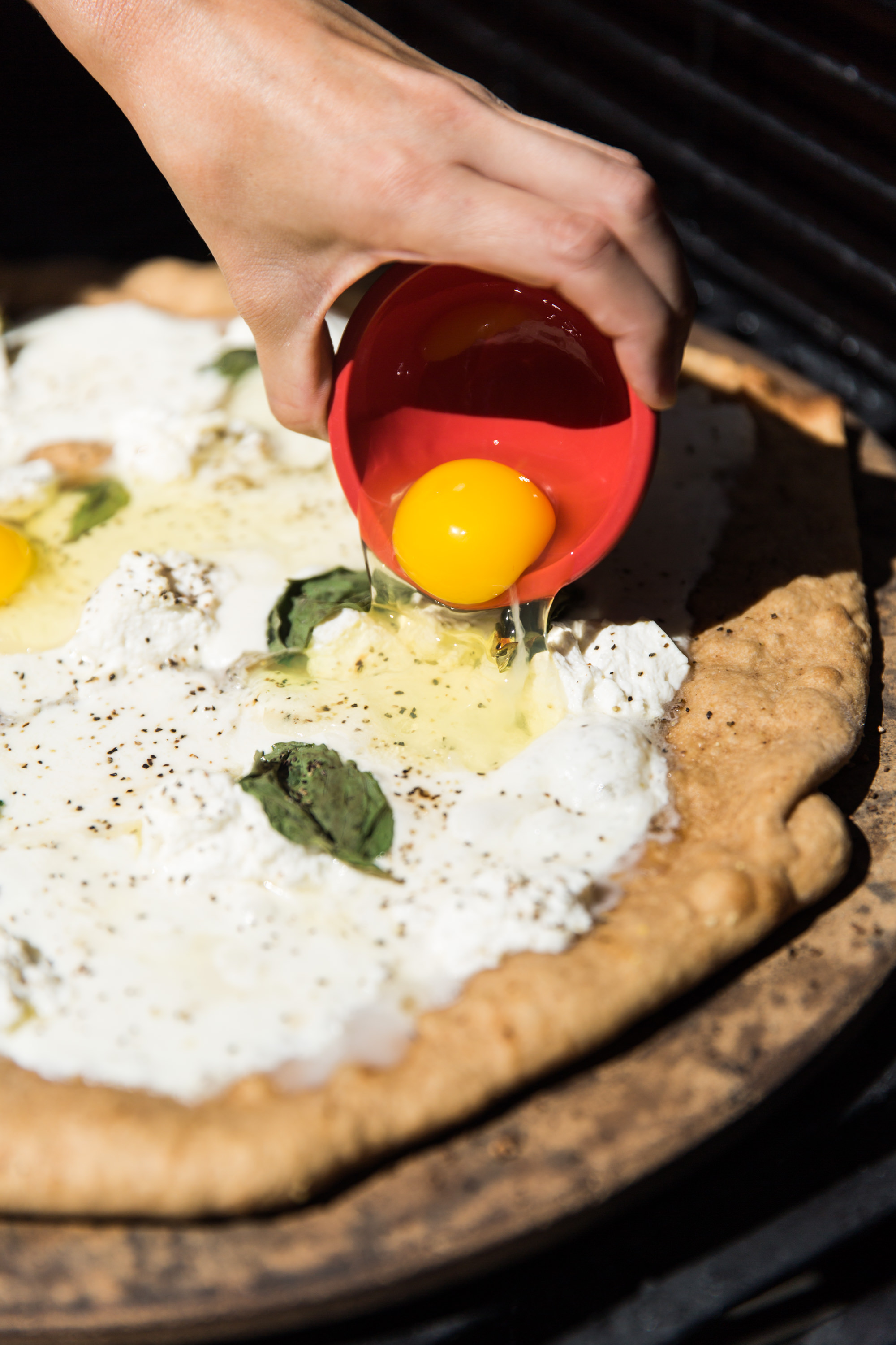 Topping Pizza With Egg