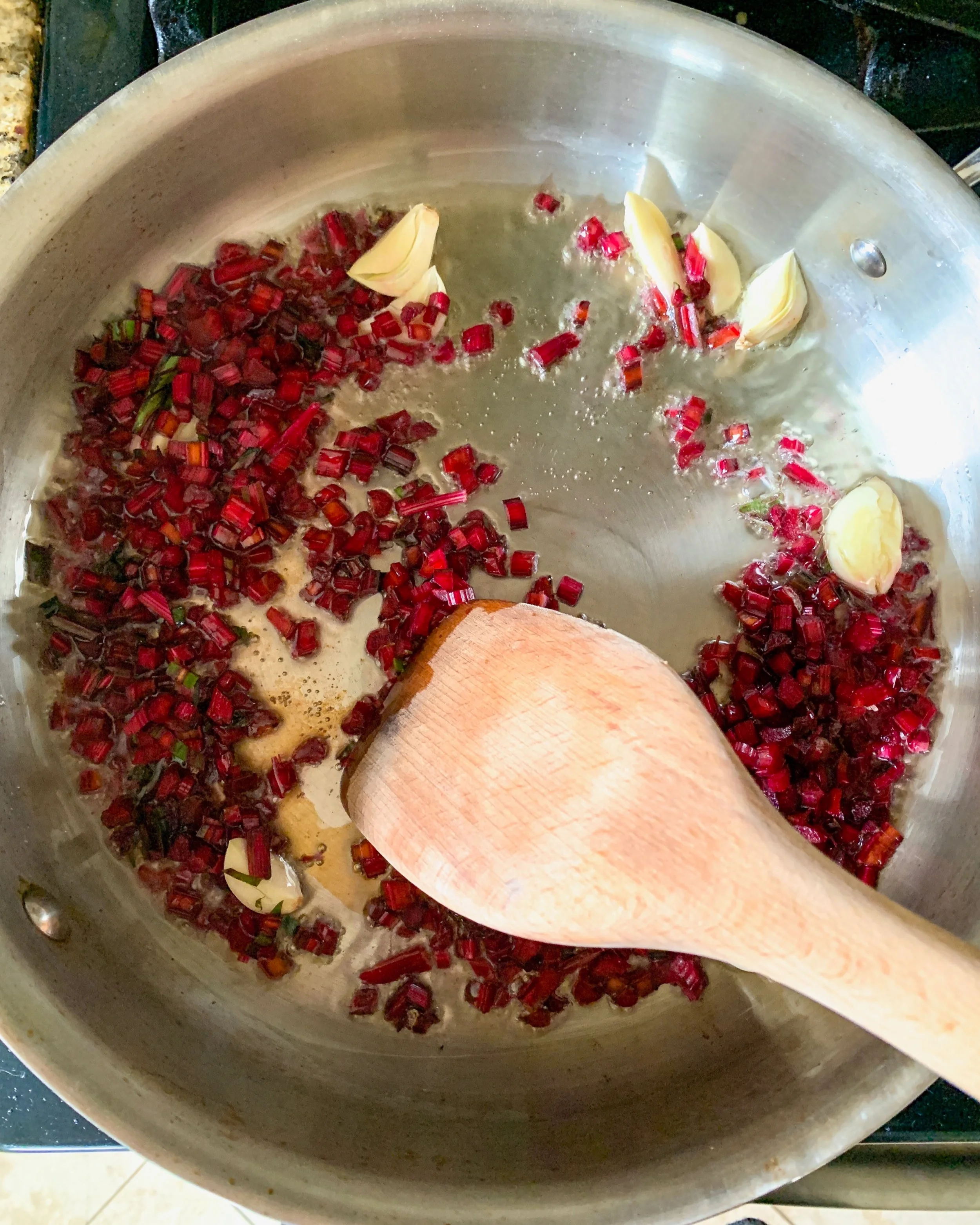 sauteing+garlic+with+beet+stalks.jpg