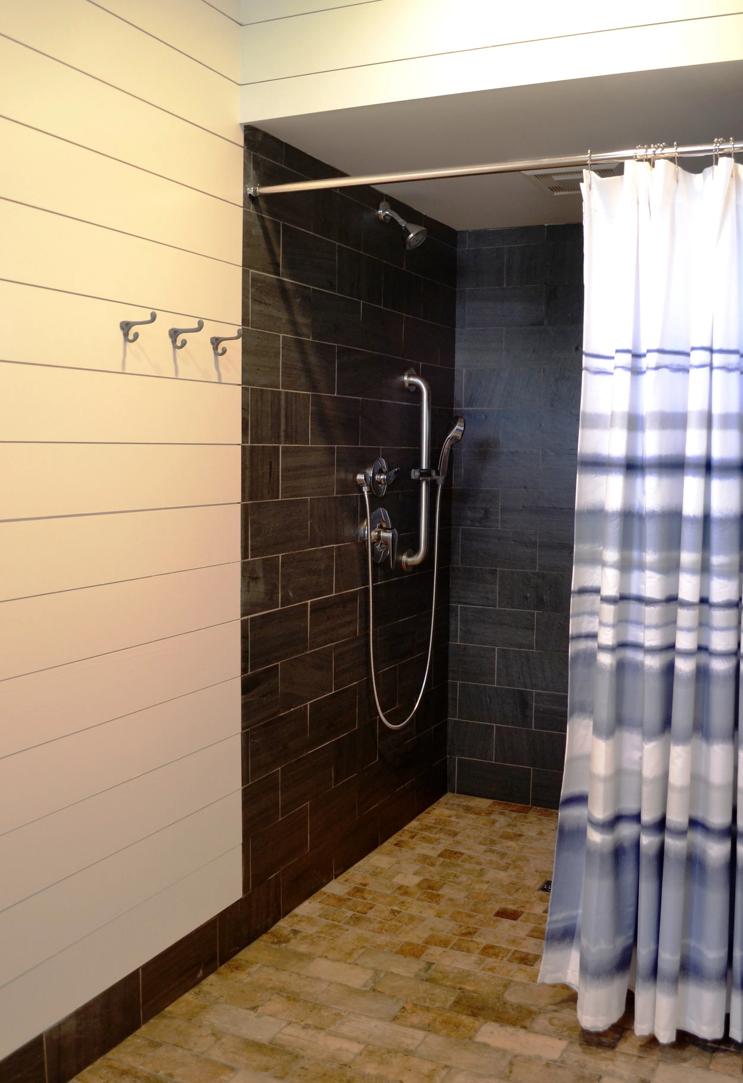 The new boat club at Basin Harbor, including a large dock for 60 boats, has its very own bathrooms with showers and a lounge room. LOVED doing these spaces! 