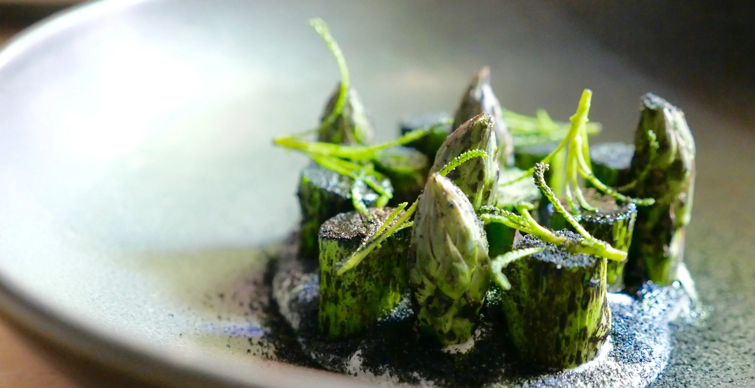 CHARGRILLED ASPARAGUS, SESAME, BLACK GARLIC, OLIVE HERB