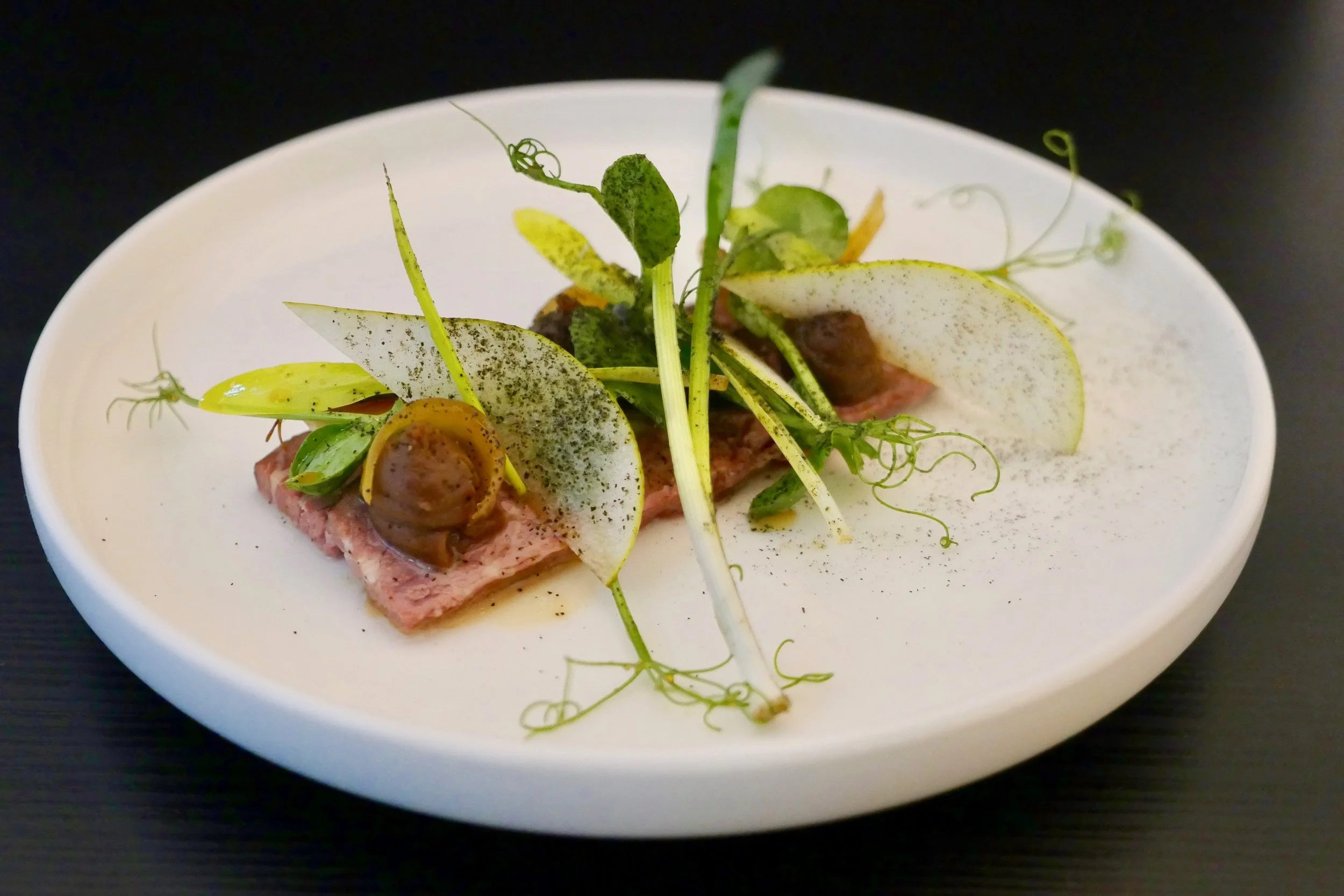 BEEF RIB, SOY POTATO, CIPOLLINI ONION, GALBI JUS, GREEN PEAR, POPCORN SHOOTS, PETITE BOUCHE PENCIL LEEK.
