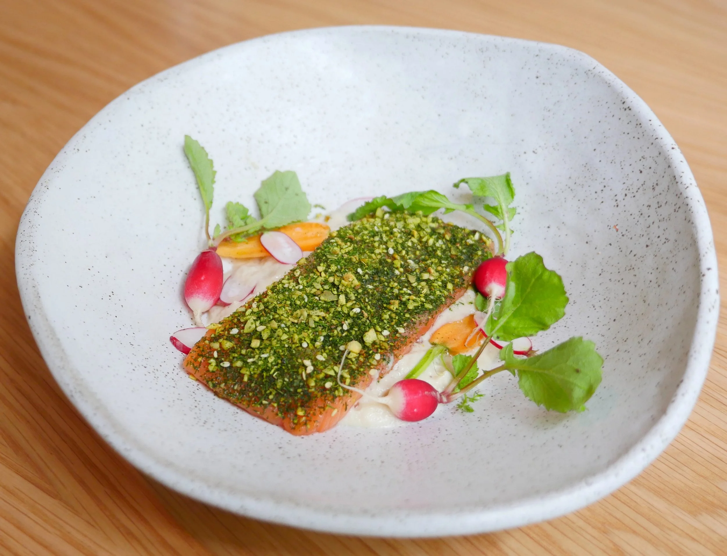 CONFIT PETUNA TROUT, FENNEL TAHINI. FERMENTED GREEN CHILLI, DILL DUKKAH, PETITE BOUCHE RADISH & CARROTS. 
