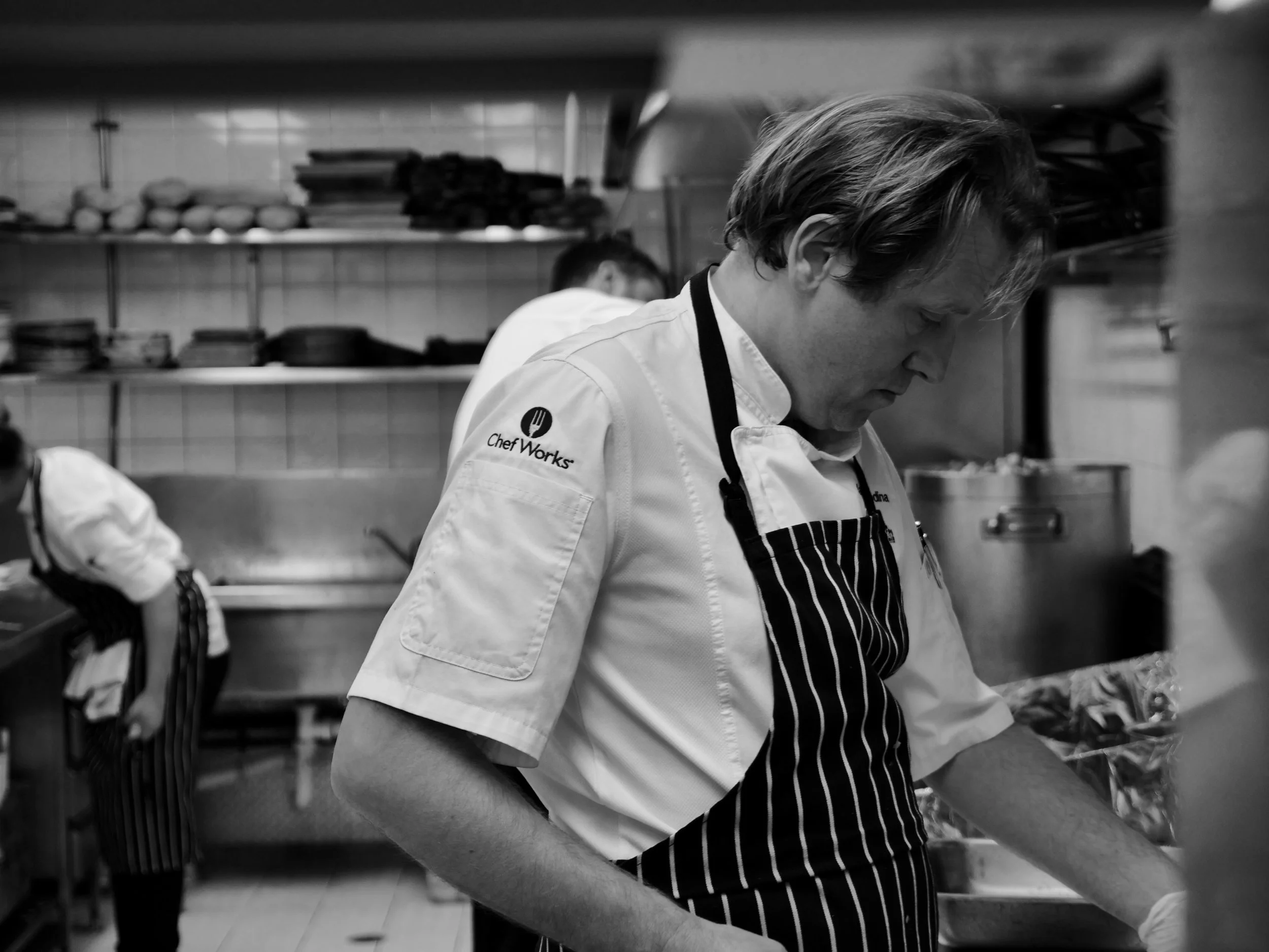 JAVIER PREPARING HIS PETITE BOUCHE DISHES.