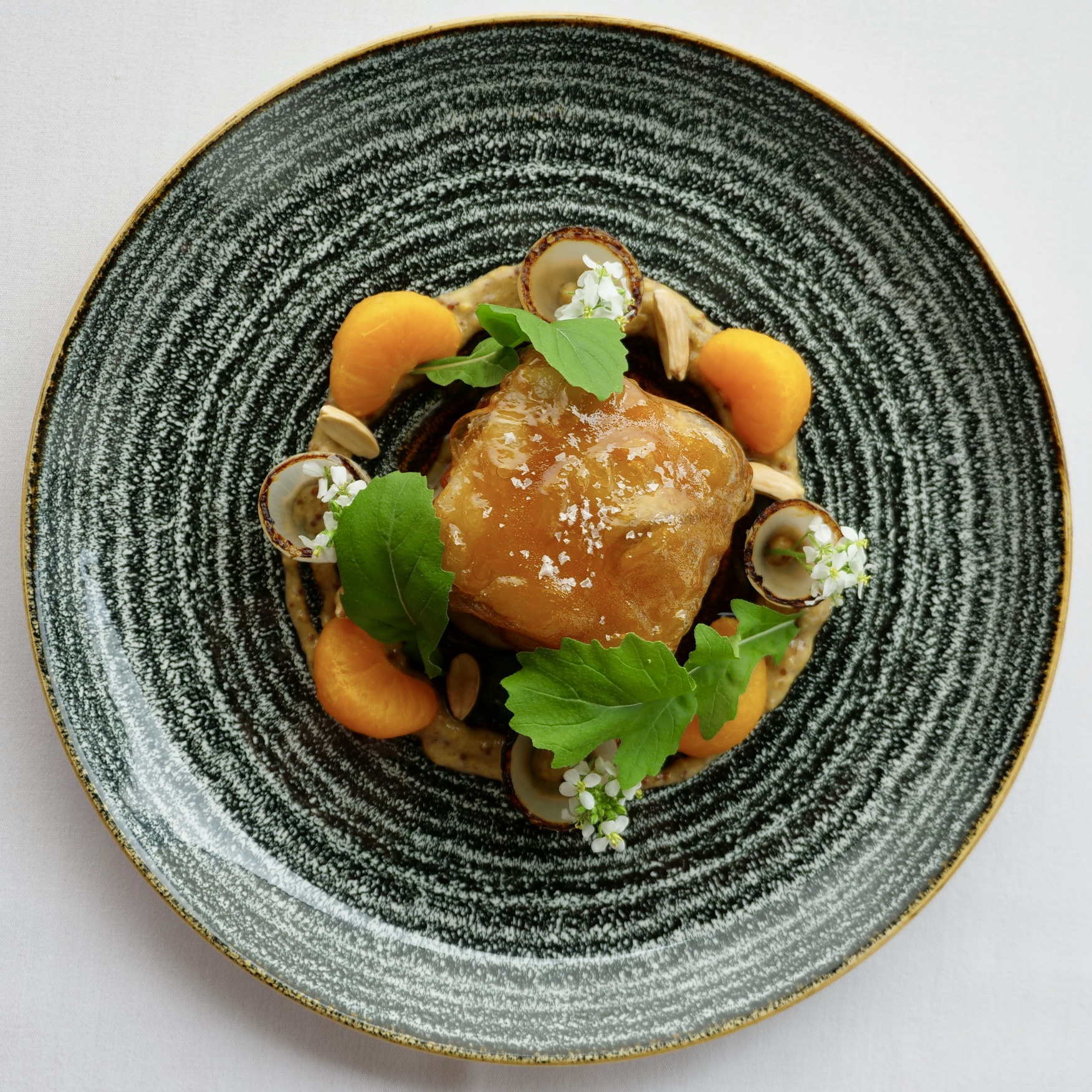 BYRON BAY BERKSHIRE PORK CHEEK, MANDARIN, FIERY MUSTARD, CHARRED ONION, GARLIC MUSTARD, ALMONDS.