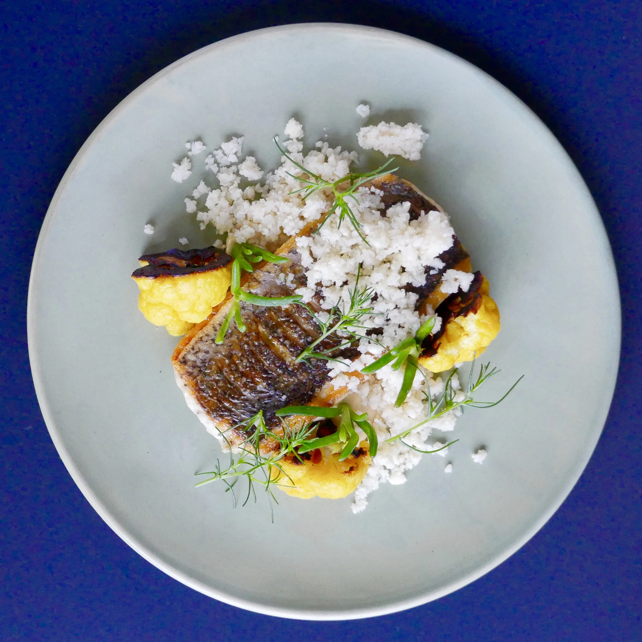PAN FRIED PALMERS ISLAND MULLOWAY, TEXTURES OF CAULIFLOWER, TURMERIC, LAND SEAWEED, KARKALLA.
