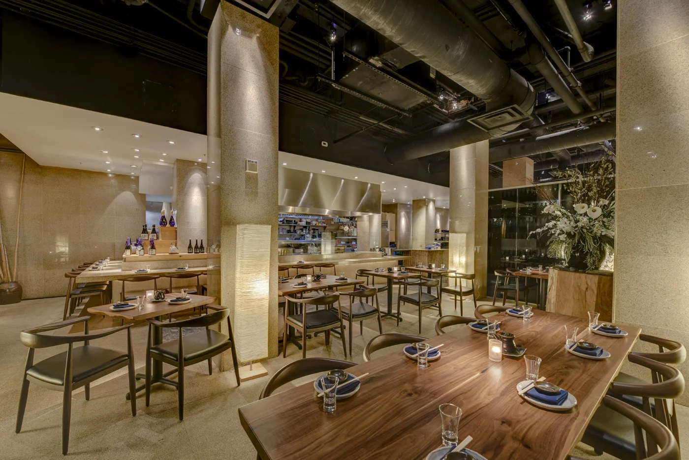 The Robata Dining room is a cozy, intimate setting featuring our open kitchen and robata grill. Translated as “around the fireplace,” robata taps into the ancient Japanese custom of cooking in the irori, the traditional charcoal-fired hearth once found in every home. The Robata Dining room is a semi-private space which can accommodate up to 37 seated guests.