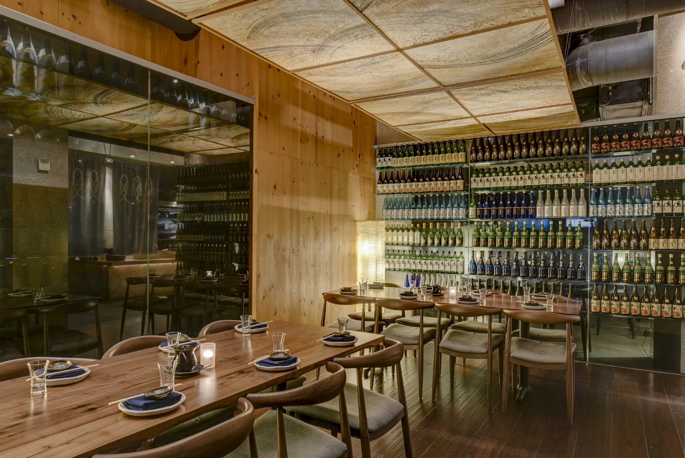 The Sake Tasting private dining room is the perfect setting for any event that requires a more intimate setting to entertain up to 20 very special guests. The room is gracefully designed and enclosed in glass walls that are dramatically lined with bottles of sake featured on the extensive sake menu.