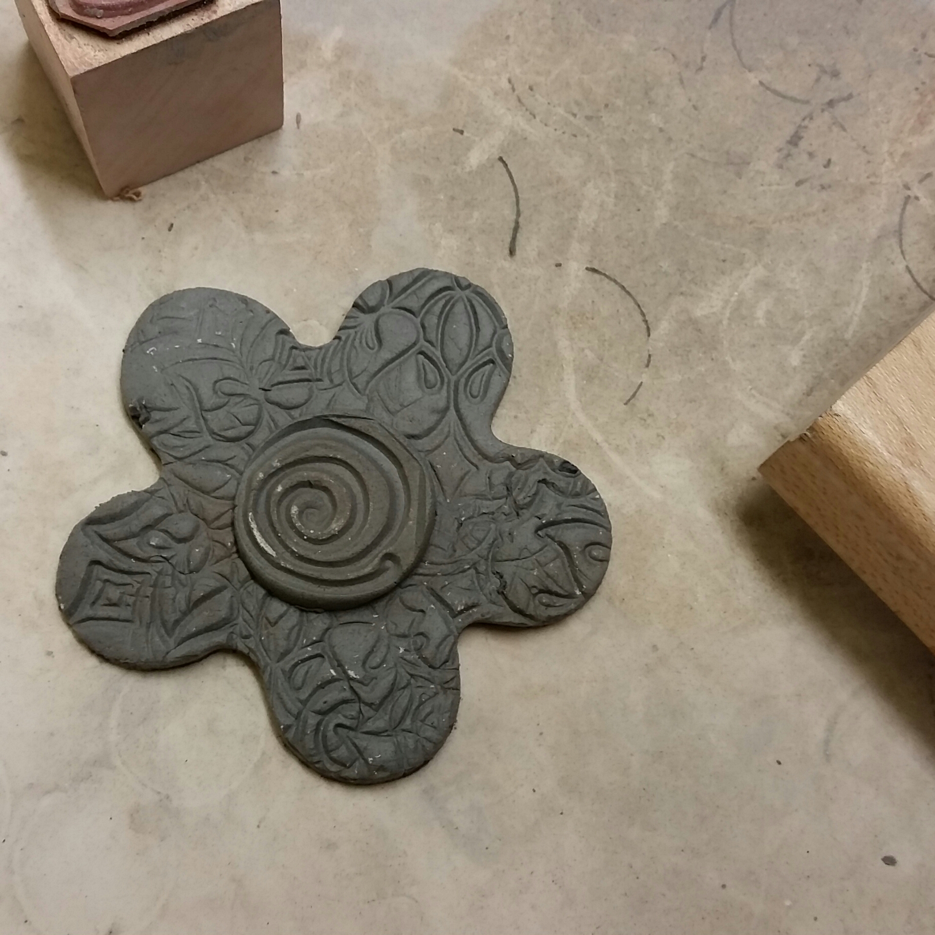 So, I did create a group of clay flowers with a lots of texture using new stamps I found at the thrift shop.