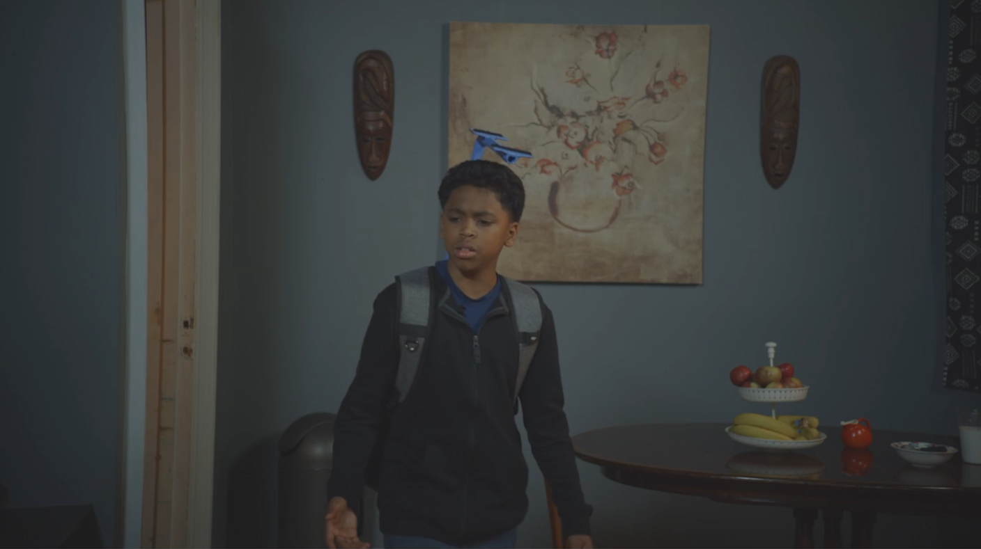  Screenshot 1: In this shot, you see that the kid has a rig over-top of his head. 