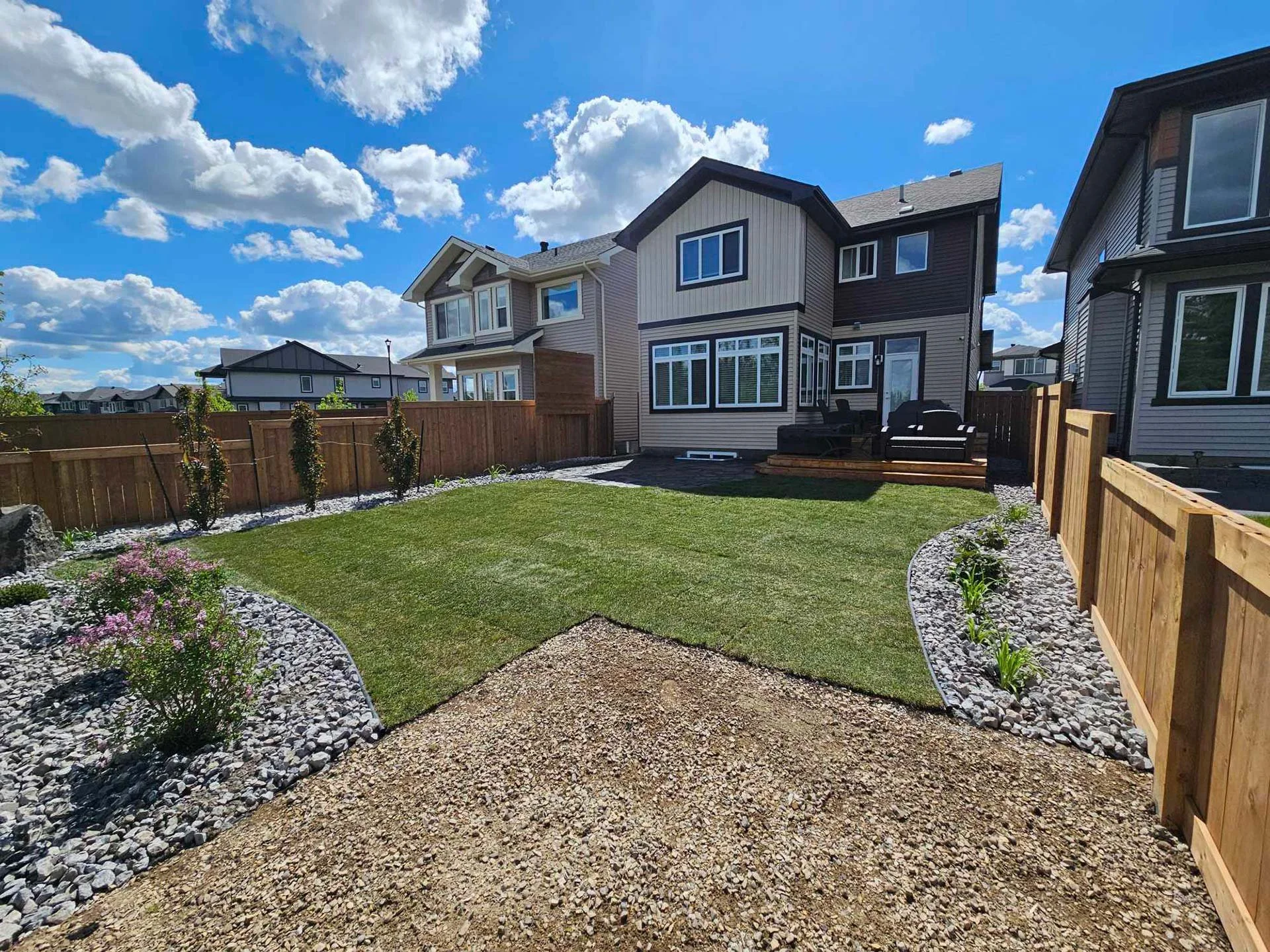 Installation for sod, rock, and shed base in Edmonton, Alberta