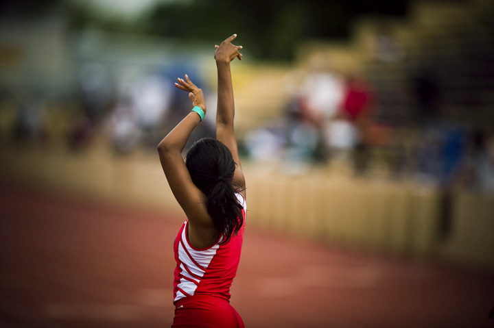  Monikkia White of Vallejo High School prepares for the second leg of the girls 4x100 meter race at the Sac Joaquin Section Finals at Sacramento City College in Sacramento. 