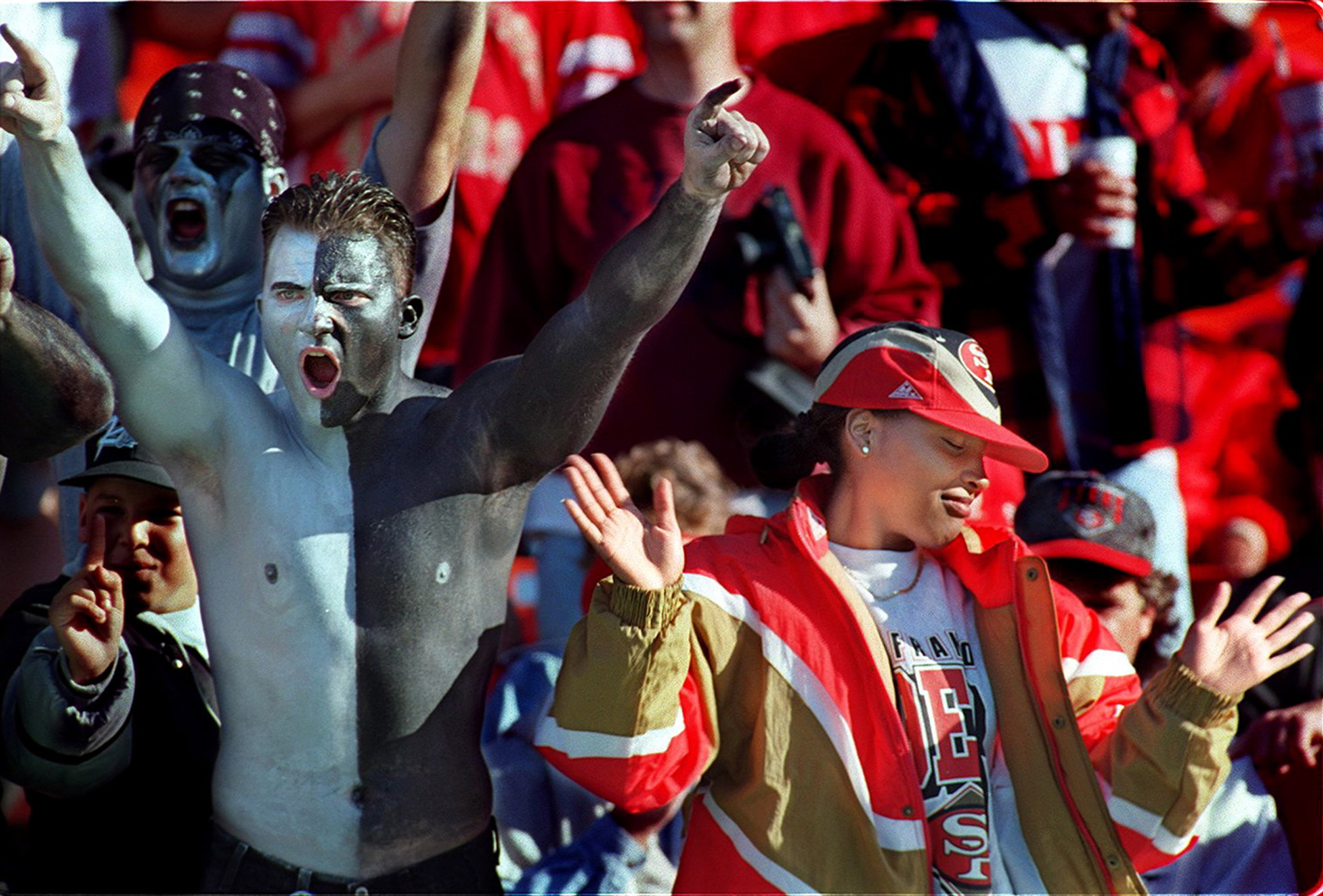  Oakland Raider and San Francisco 49er fan before a preseason game at Candlestick Park. 