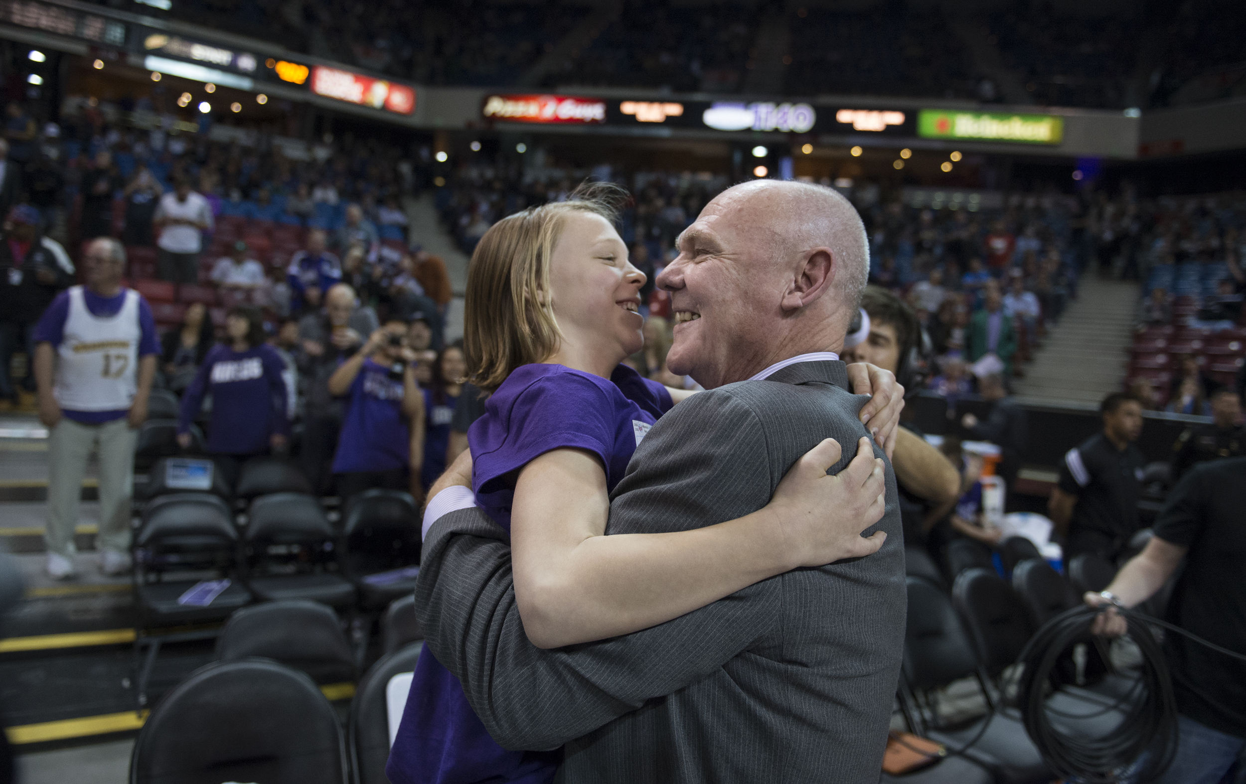  Sacramento Kings head coach George Karl embraces his daughter, Kaci, after receiving a standing ovation as he entered the the arena before the Kings play host to the Boston Celtics. 