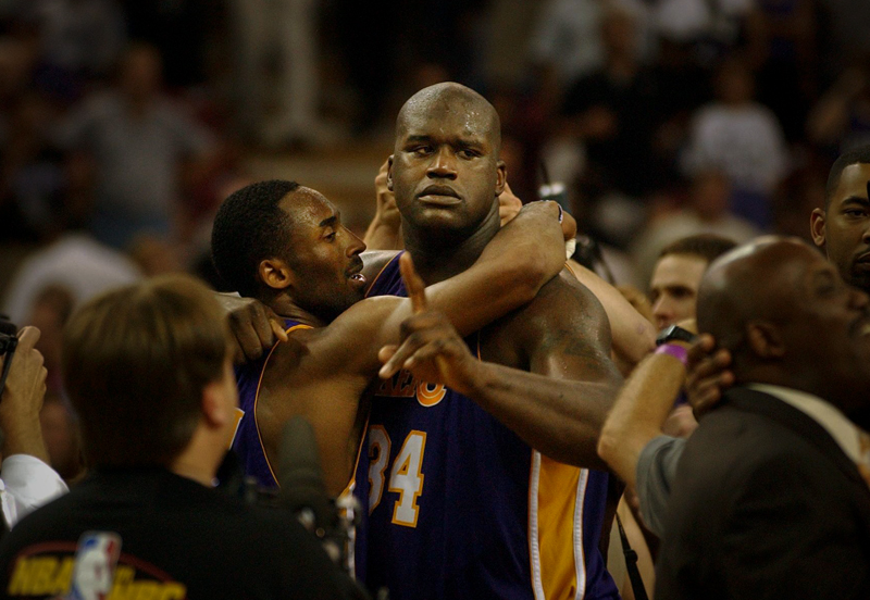  Kobe Bryant and Shaquille O'Neal celebrate their victory in game seven of the NBA Western Conference Finals between the Sacramento Kings and the Los Angeles Lakers at Arco Arena, Sunday, June 2, 2002. 