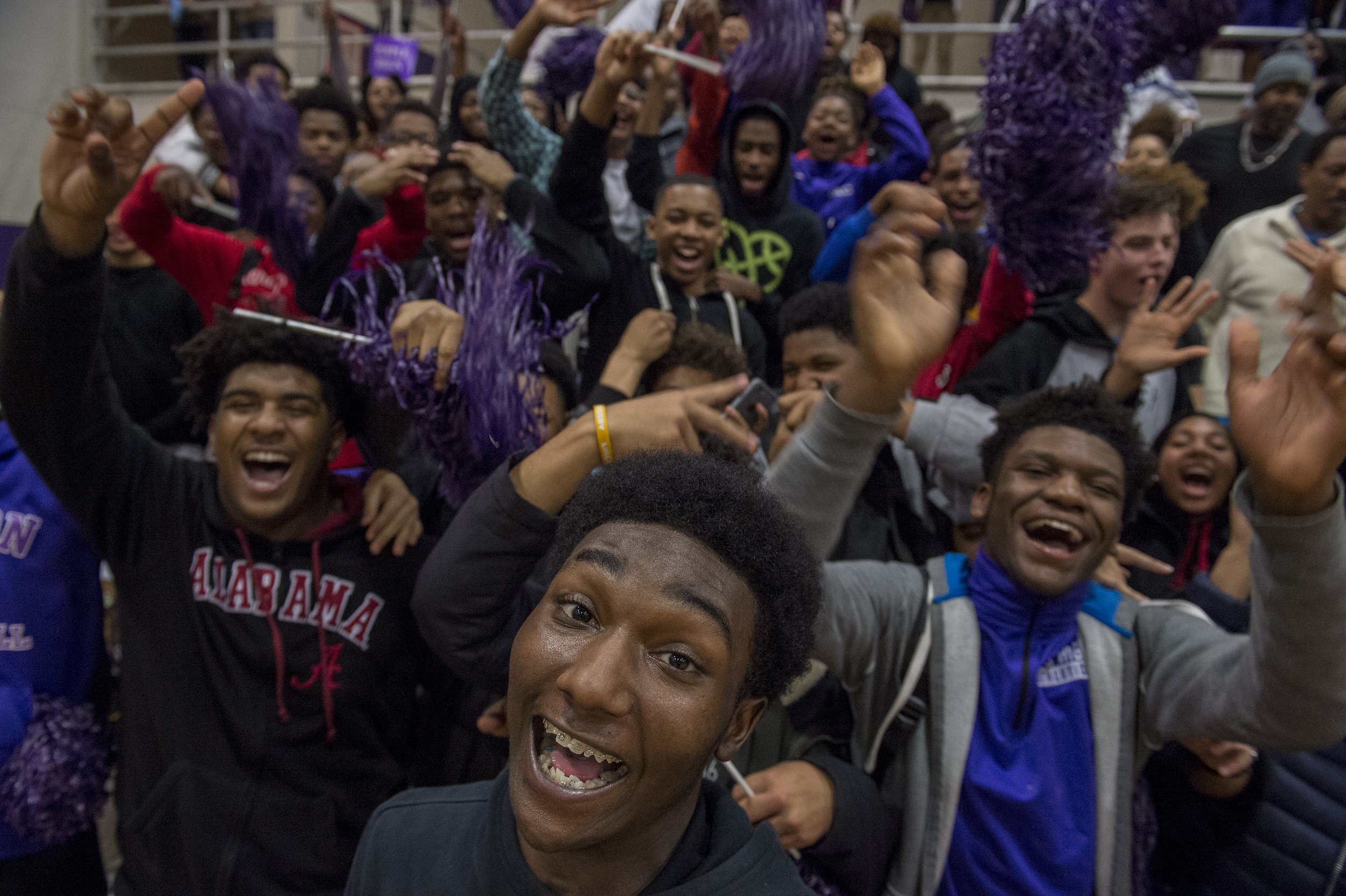  The Sacramento High School student section celebrates as the final seconds tick off as No. 14 Sacramento knocks off No. 3 Burbank 61-56 at Sacramento High School. 