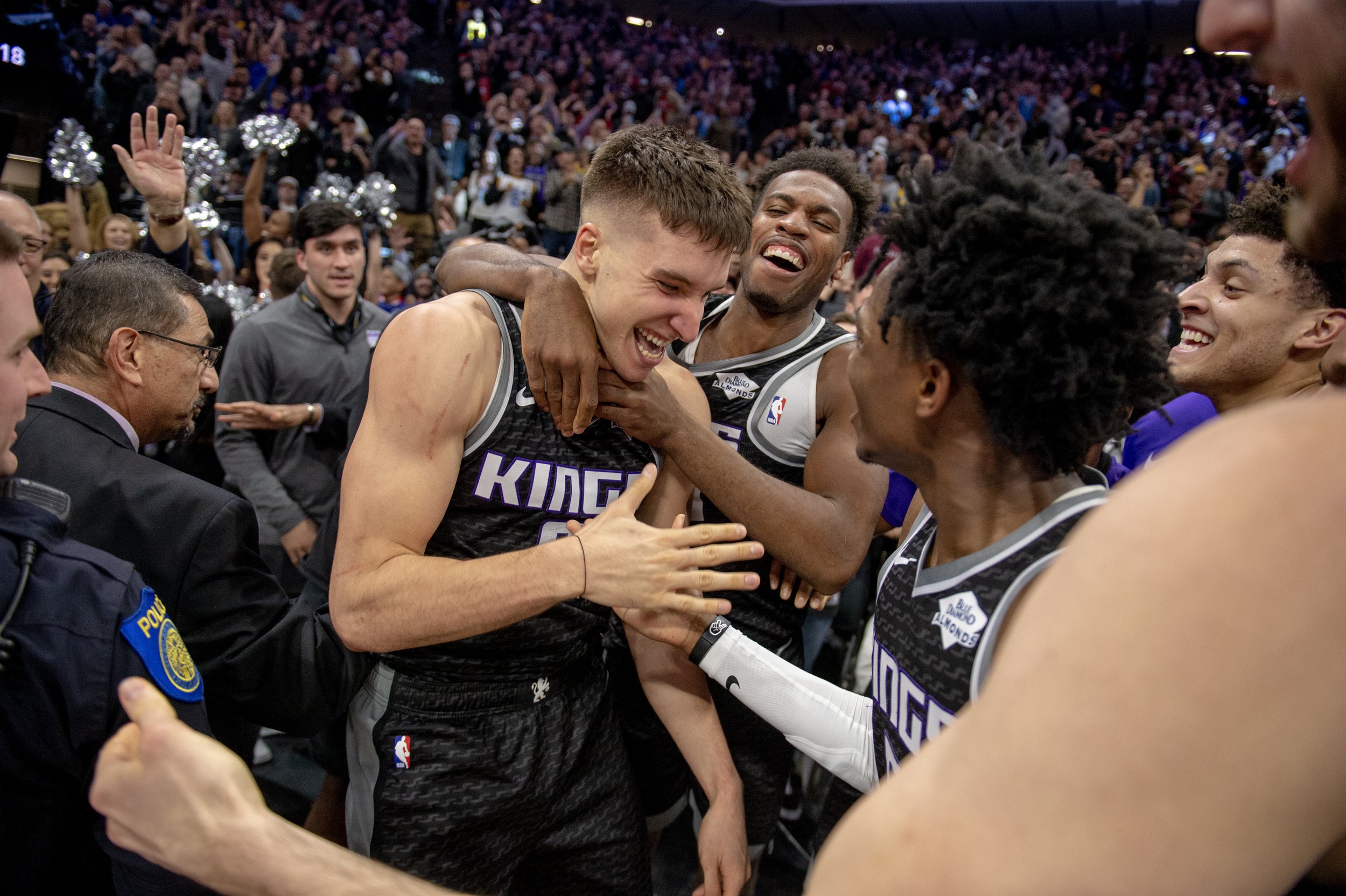  Sacramento Kings guard Bogdan Bogdanovic (8) is mobbed by teammates after scoring a three point shot over Los Angeles Lakers center Tyson Chandler (5) at the end of regulation to give the Kings a 117-116 victory. 