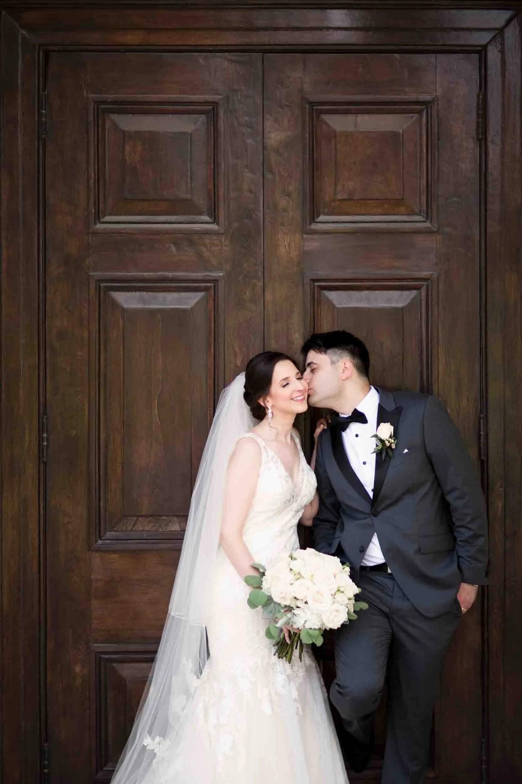 Wedding portrait at Dundurn Castle wooden doors