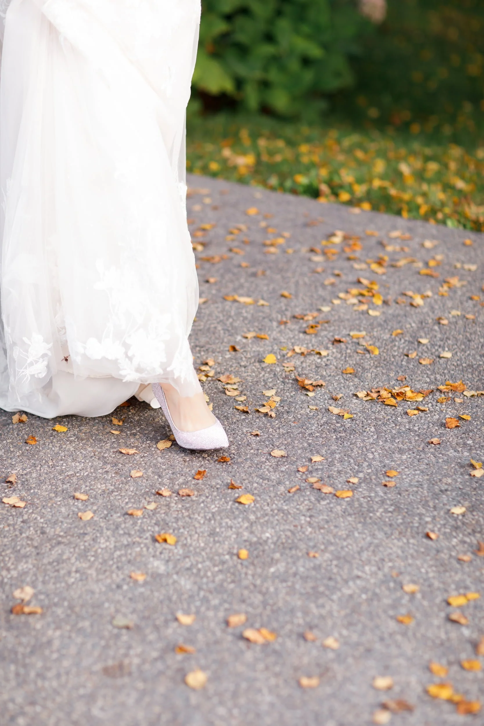 Bridal shoes on autumn leaves at the Arlington Estate in Vaughan