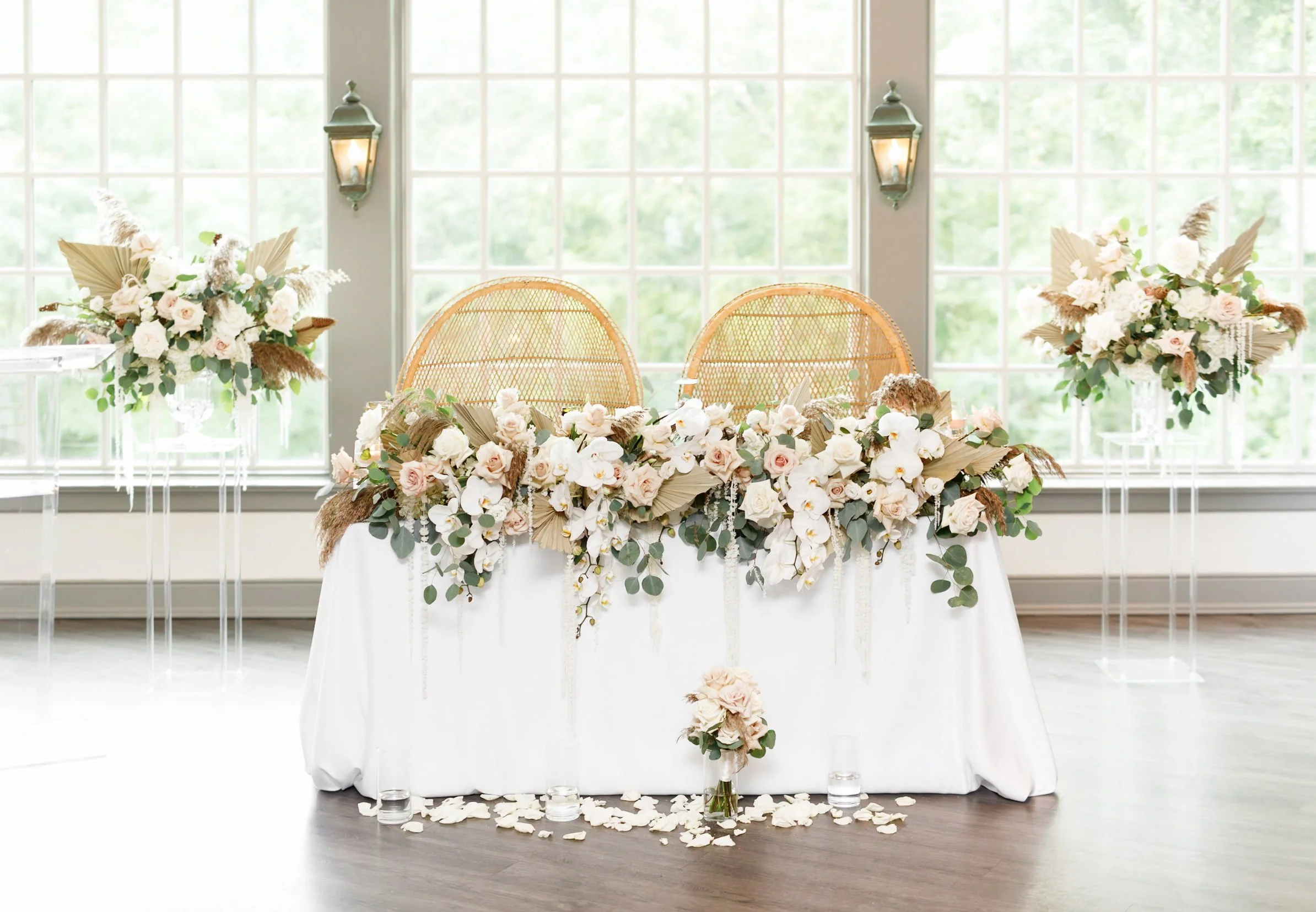 Floral sweetheart table inside reception space at The Doctor’s House wedding in Kleinburg, Ontario