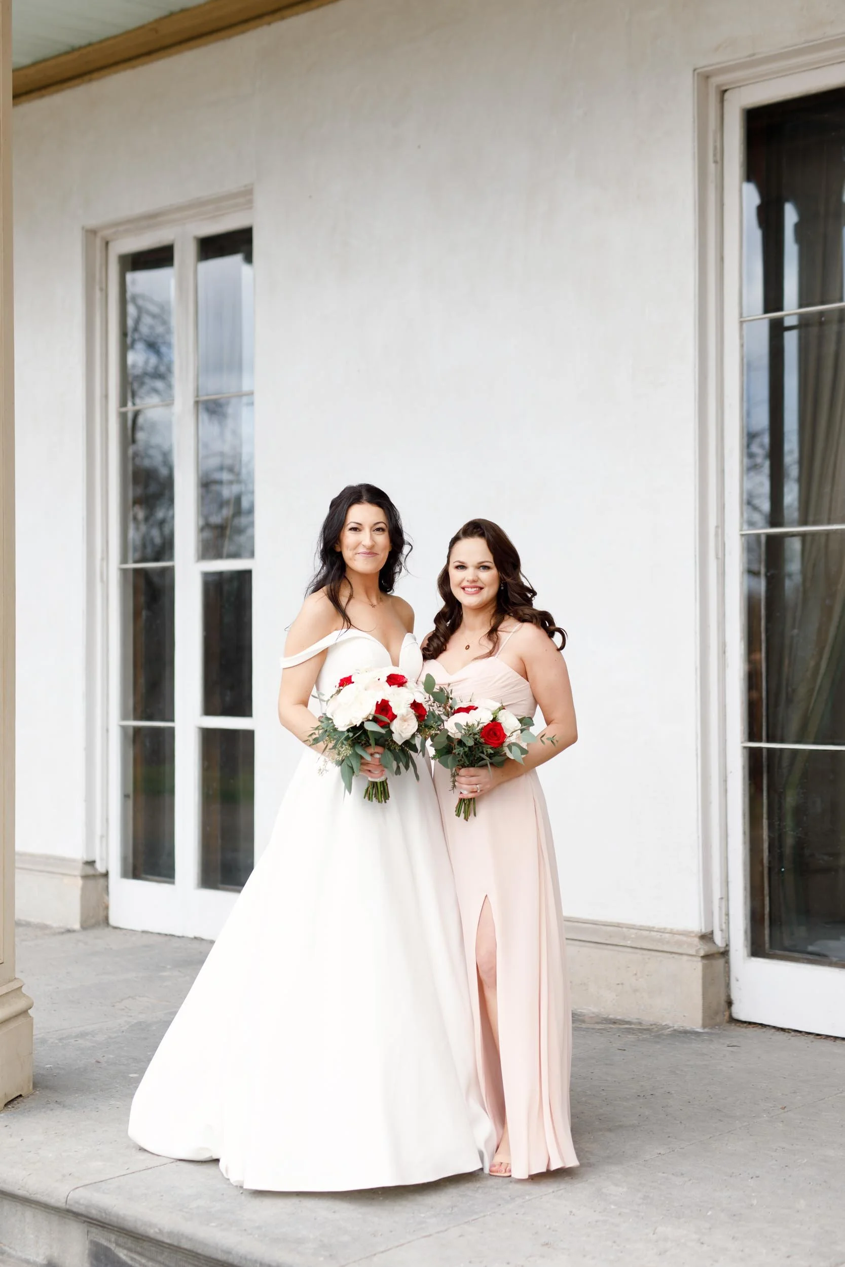 Bride with bridesmaids at Dundurn Castle windows