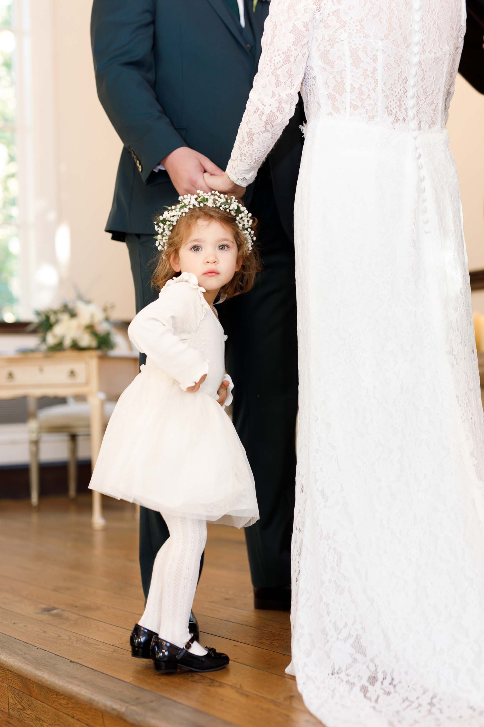 Flower girl during ceremony at the Ancaster Mill in Ancaster