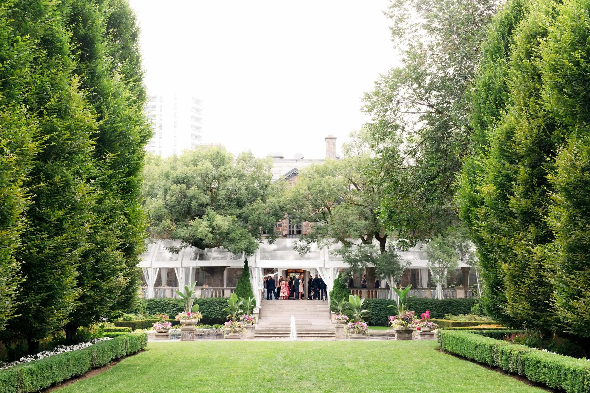Outdoor ceremony lawn with estate backdrop at Graydon Hall Manor