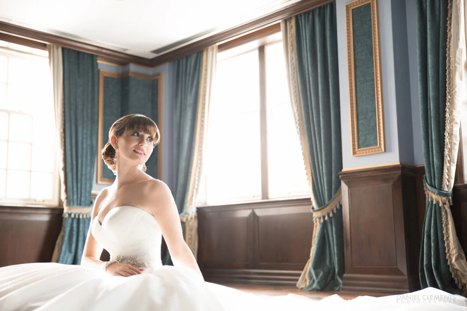 Bride and posing on the floor of the sultan suite  during her Windsor Arms Hotel wedding in Toronto