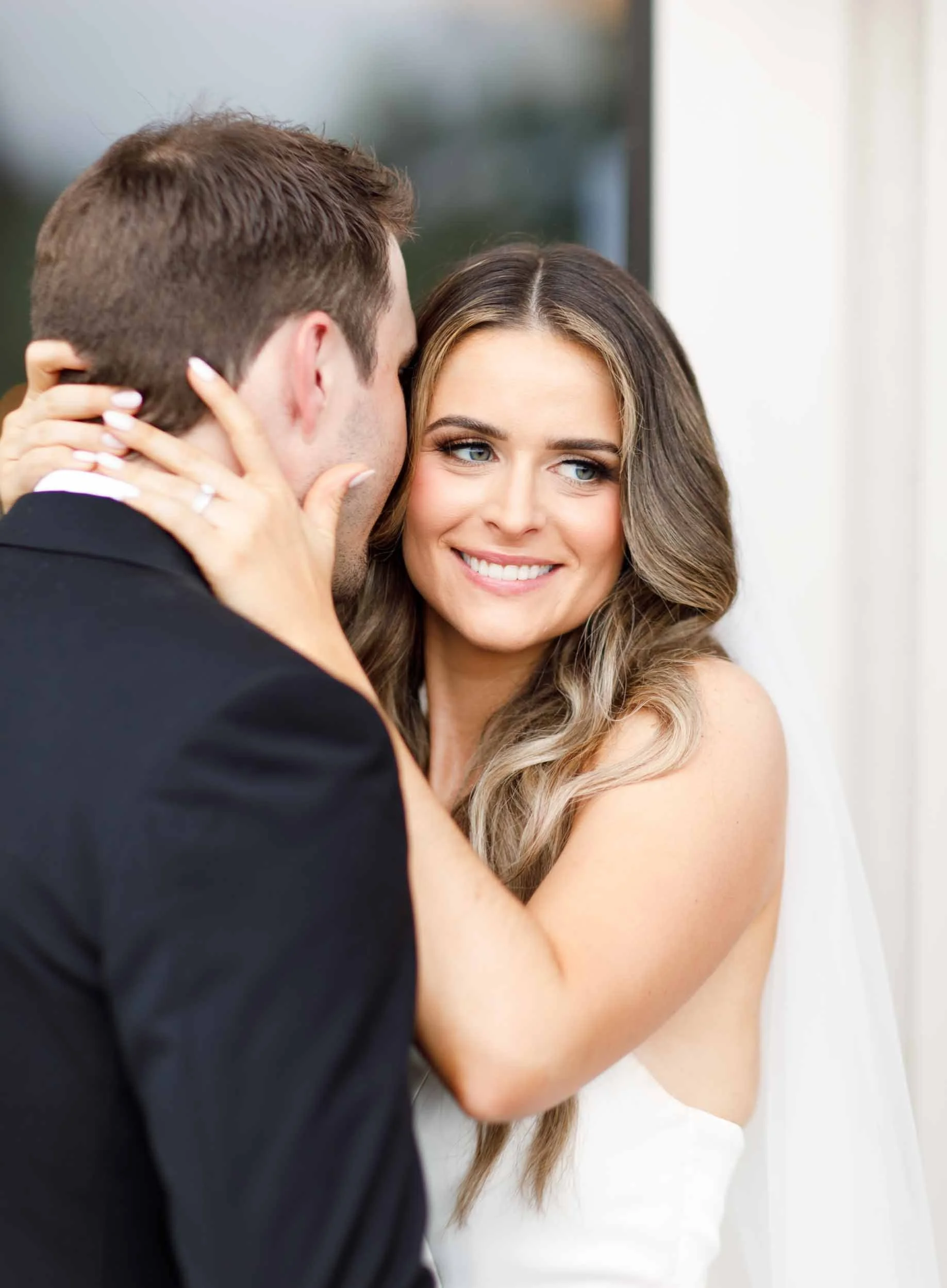 Bride and groom embracing during their Niagara-on-the-Lake wedding in Ontario