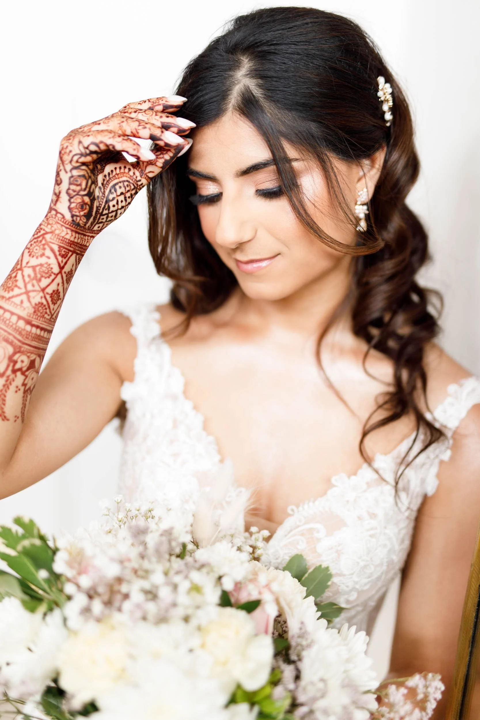 Bride holding her bouquet at a Whistle Bear wedding in Cambridge, Ontario