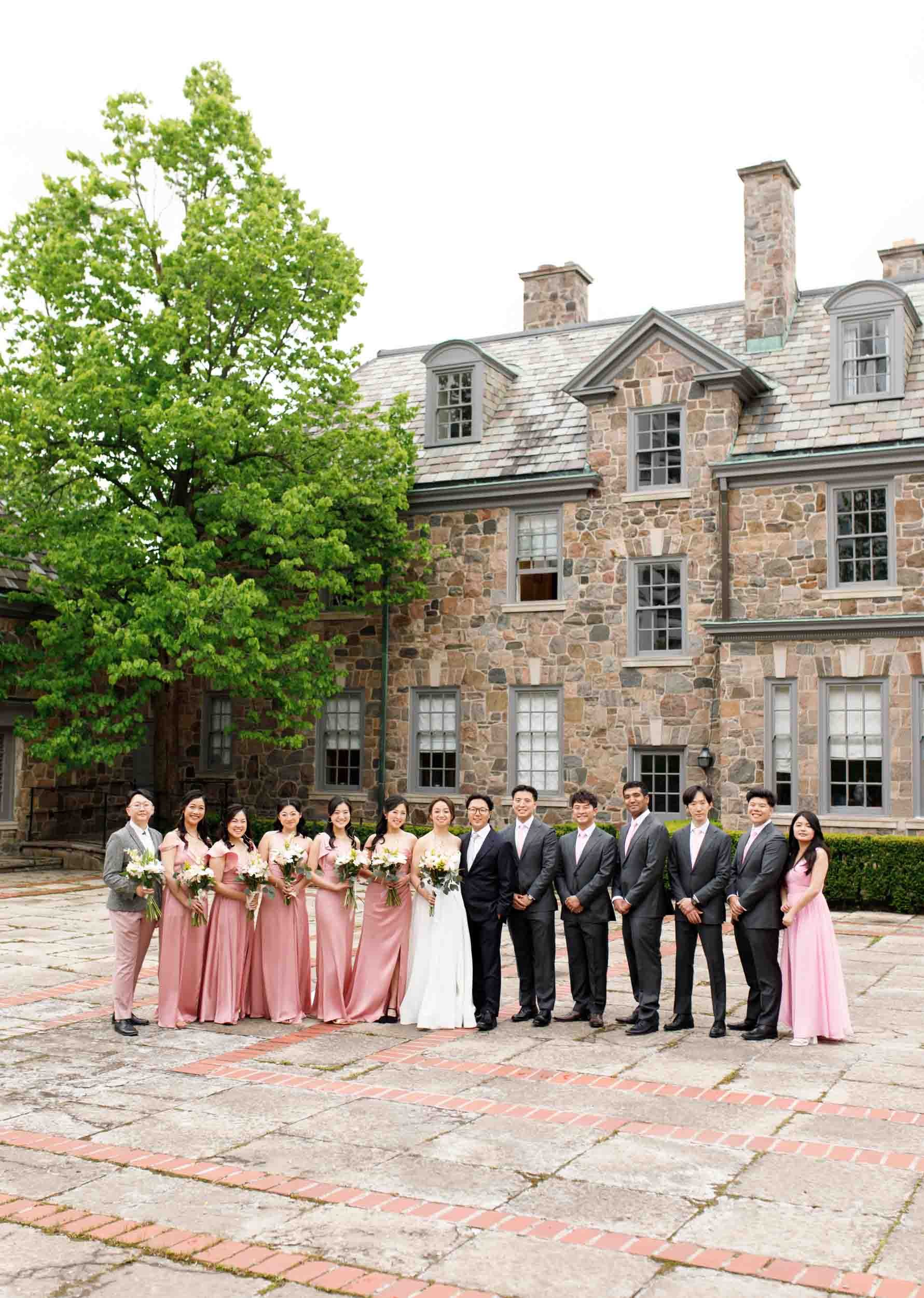 Wedding party outside Graydon Hall in Toronto