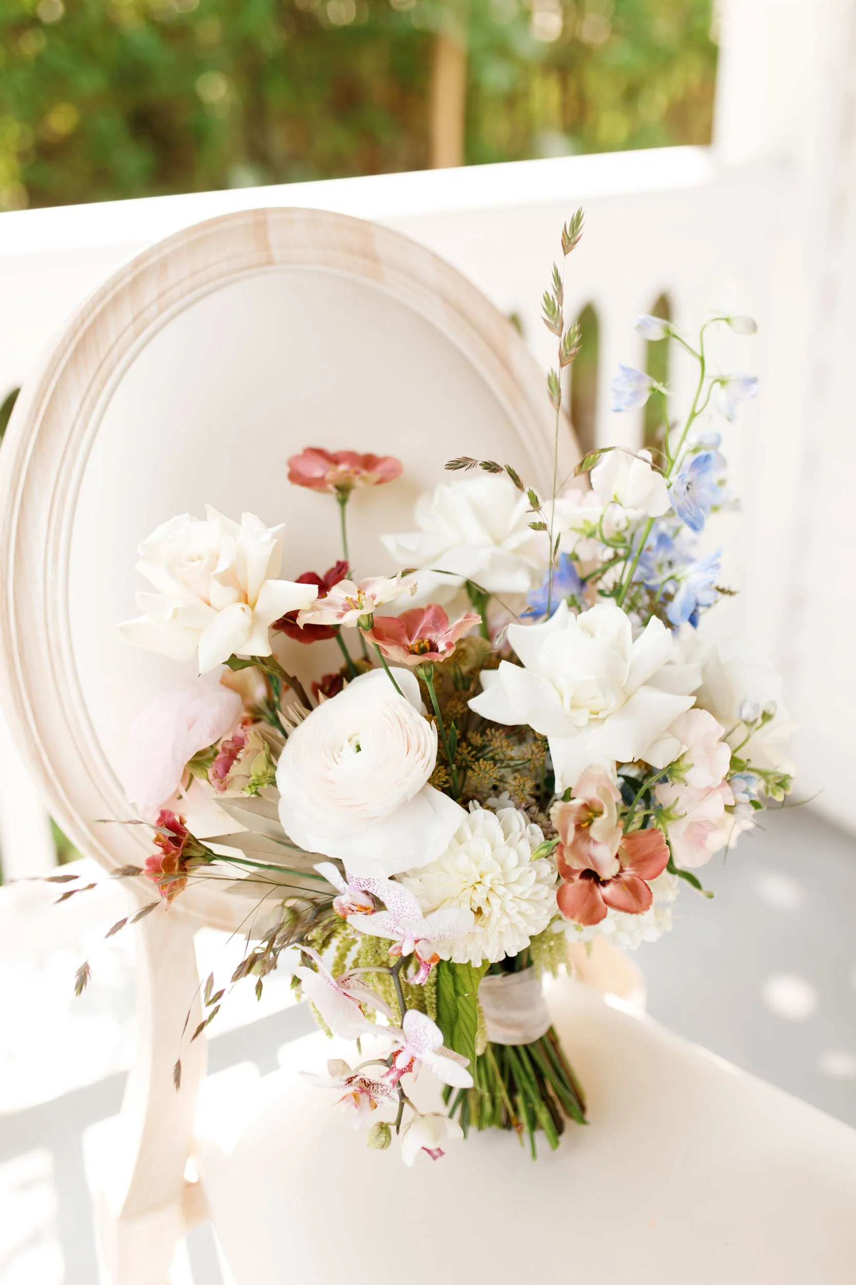 Bride’s wedding bouquet on chair at The Doctor’s House in Kleinburg, Ontario