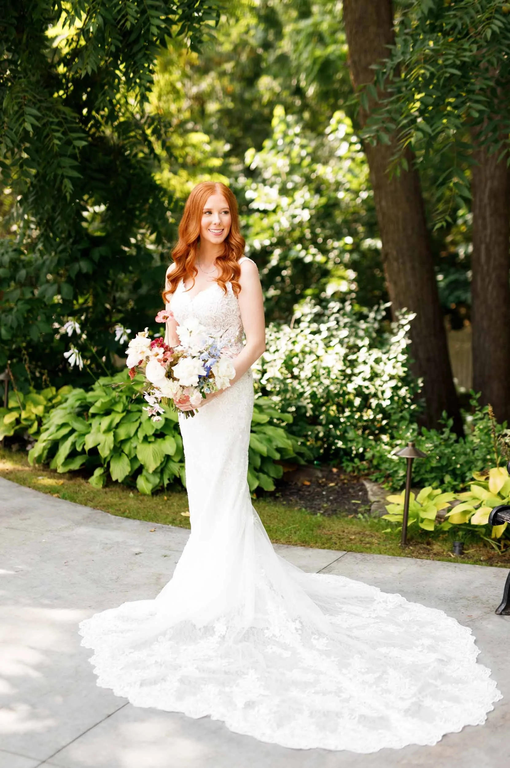 Full-length bride in wedding dress at The Doctor’s House in Kleinburg, Ontario