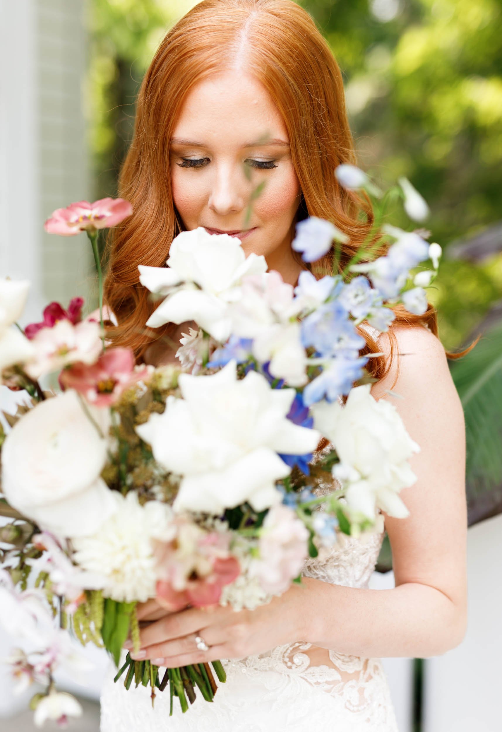 Bride holding bouquet at The Doctor’s House in Kleinburg, Ontario wedding