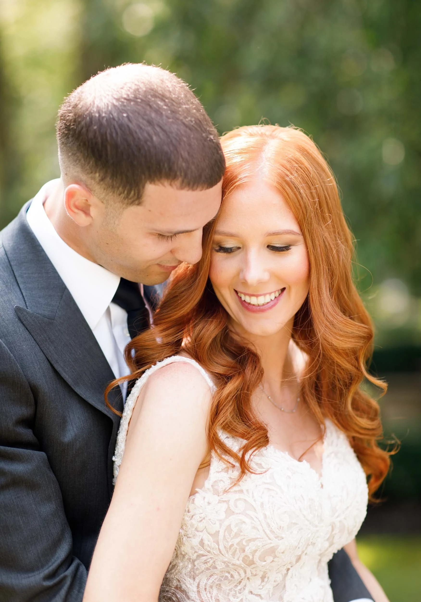 Bride and groom smiling together at The Doctor’s House in Kleinburg wedding