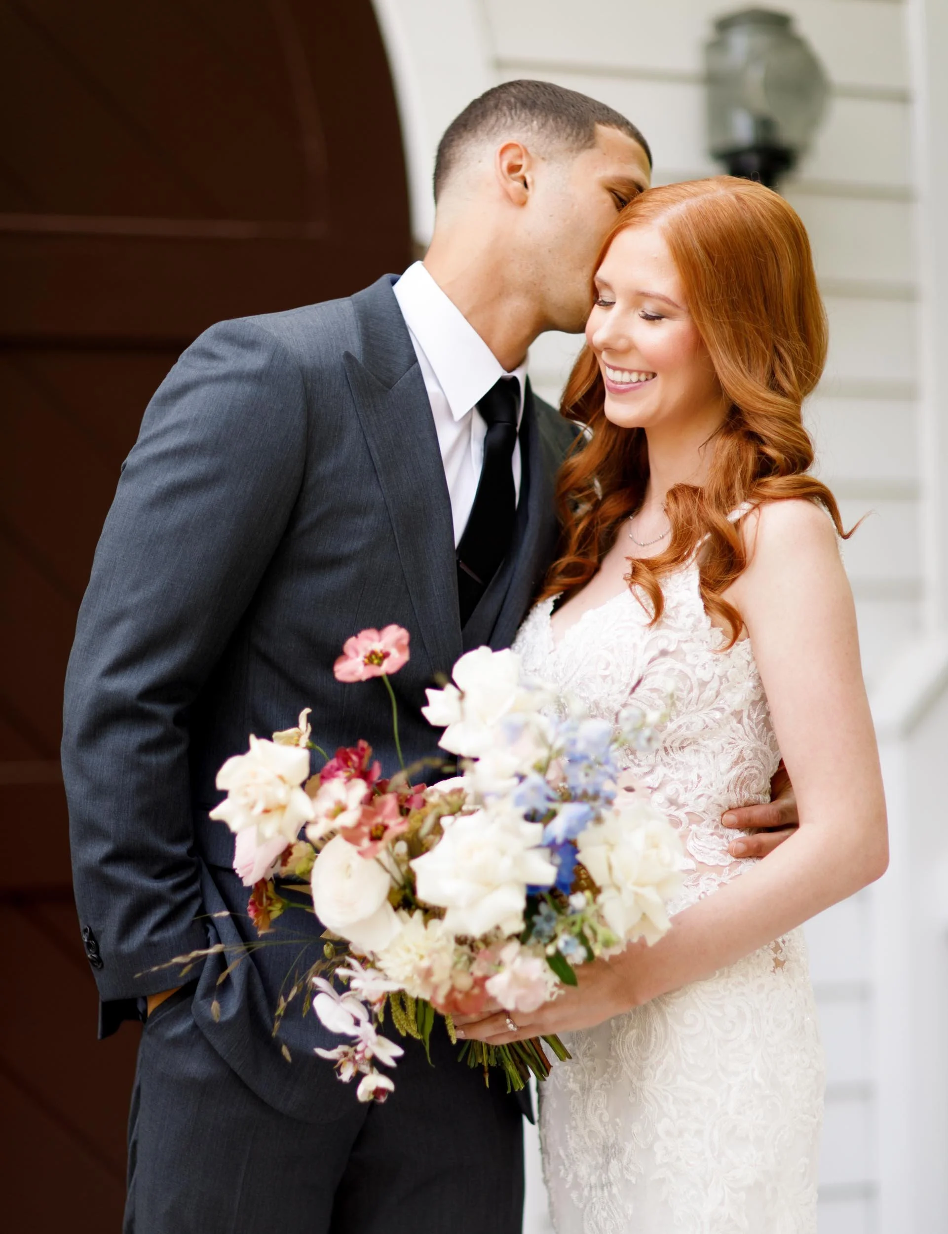 Bride and groom close-up on porch at The Doctor’s House in Kleinburg, Ontario