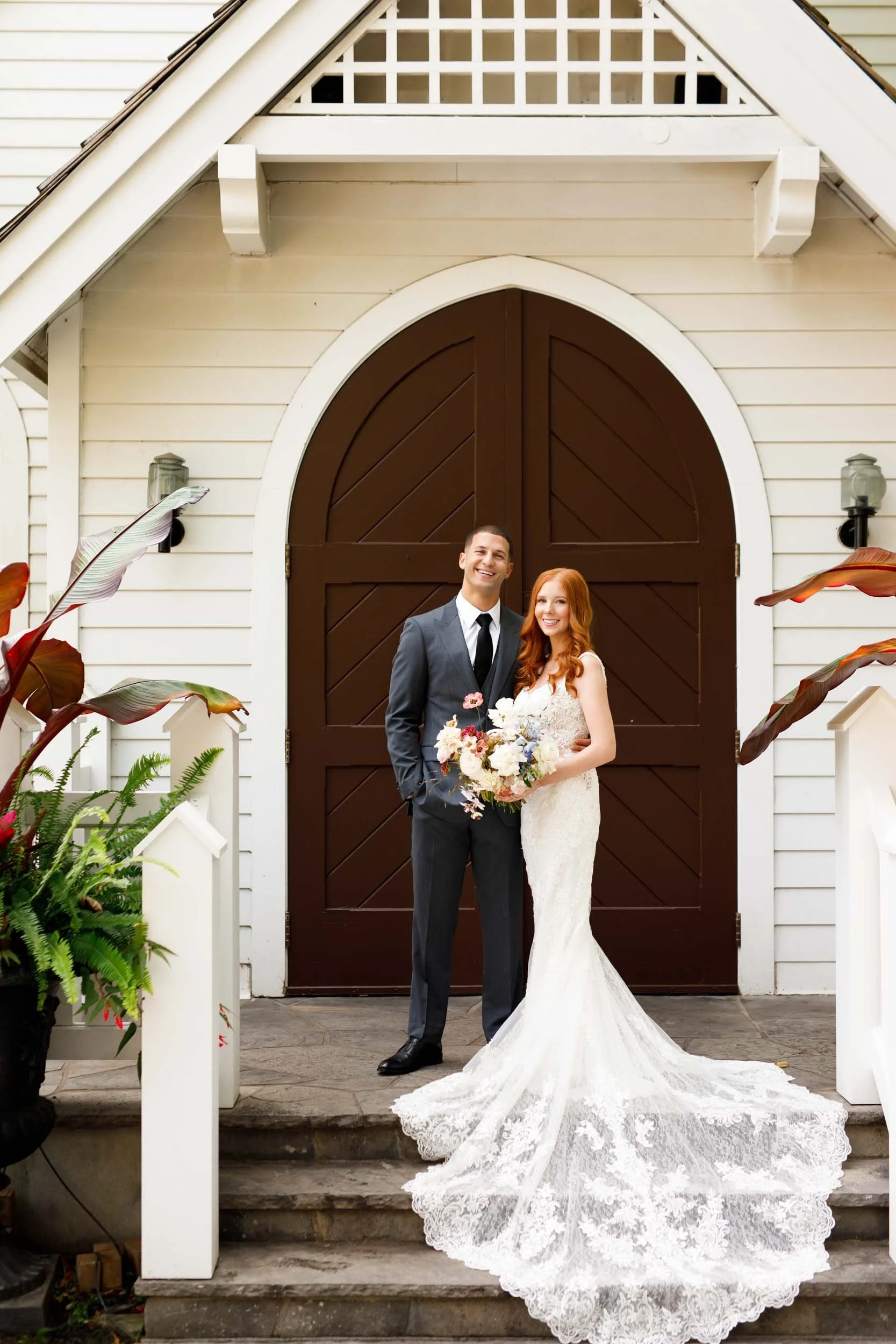 Bride and groom on chapel steps at The Doctor’s House in Kleinburg wedding