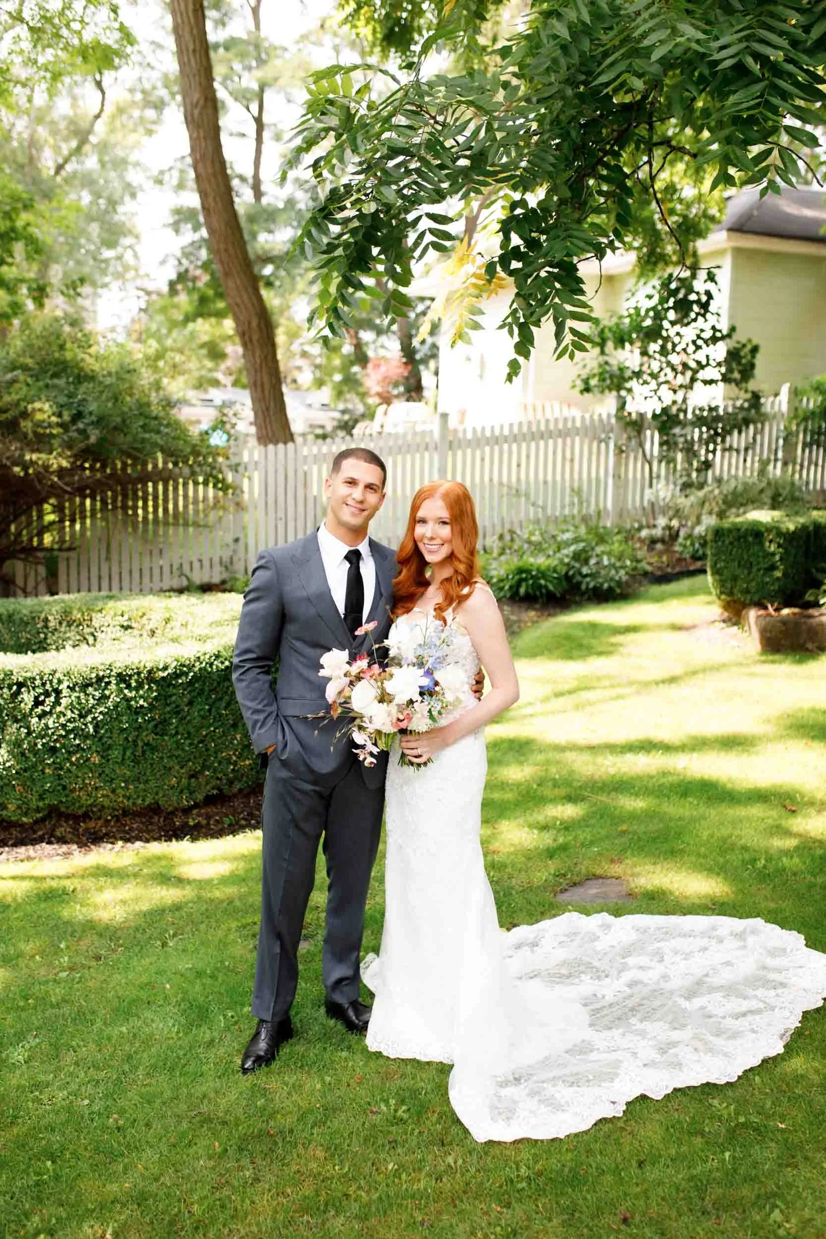 Bride and groom standing together at The Doctor’s House in Kleinburg wedding