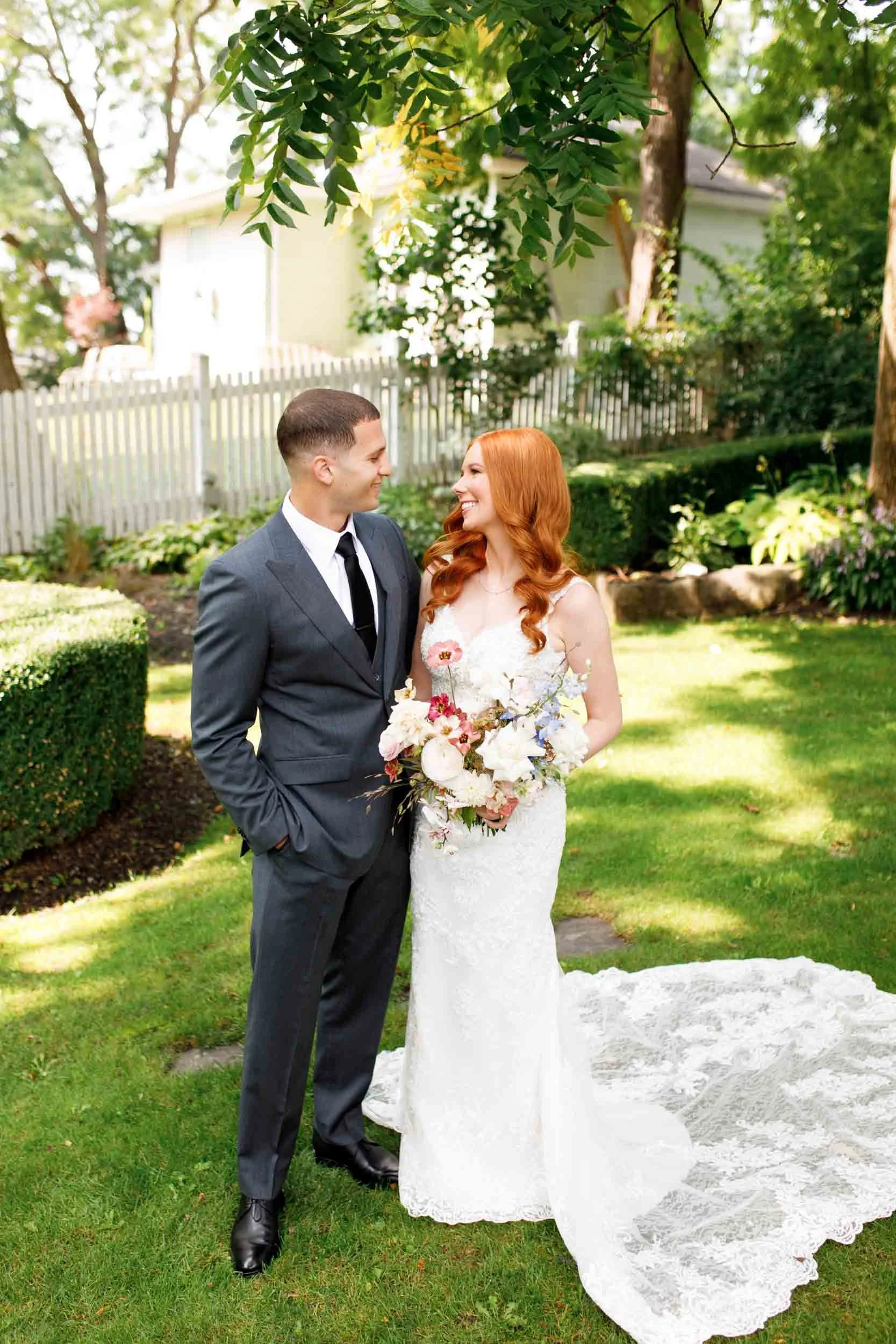 Bride and groom embracing after first look at The Doctor’s House in Kleinburg