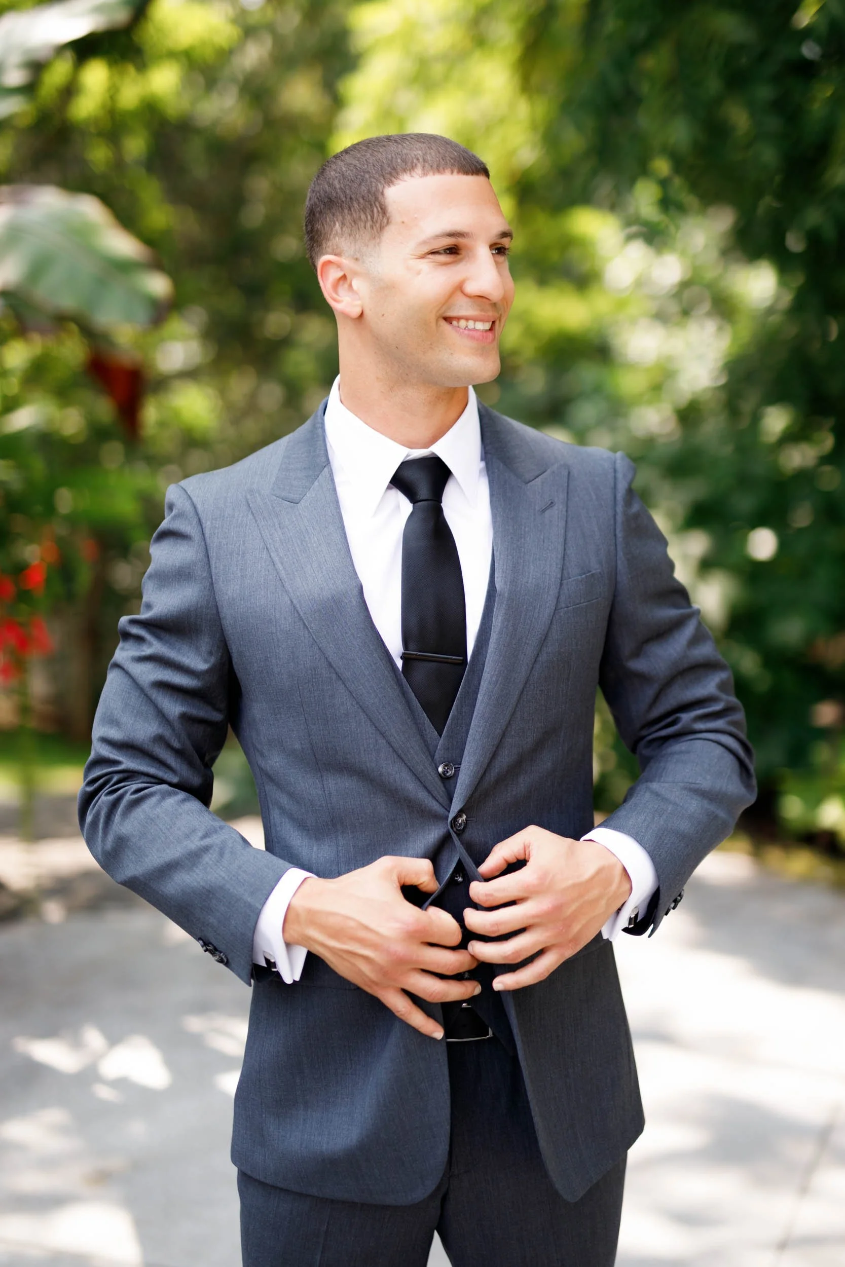 Groom smiling outdoors at The Doctor’s House in Kleinburg, Ontario wedding